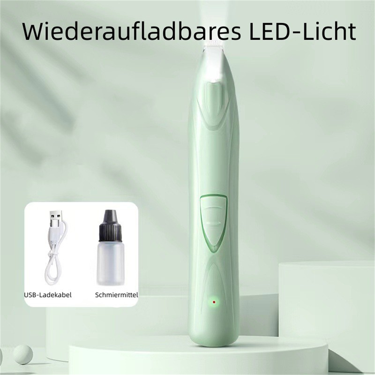 Grüner elektronischer Nagelknipser mit Zubehör.