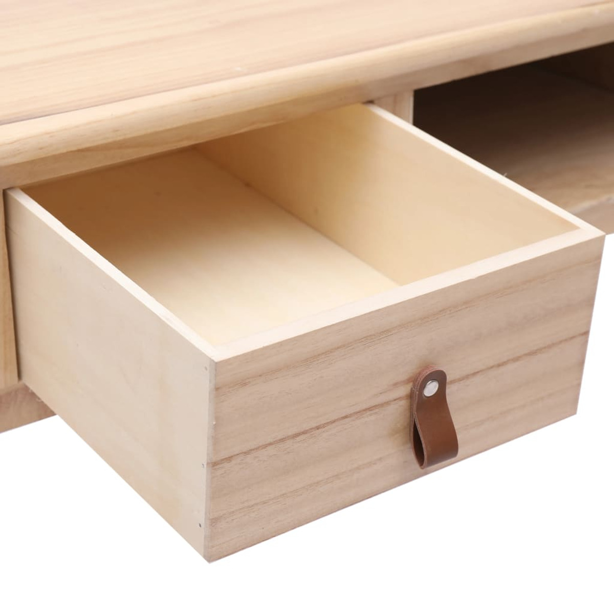 Eine Holzschublade mit braunem Ledergriff, geöffnet, mit Blick ins Innere.