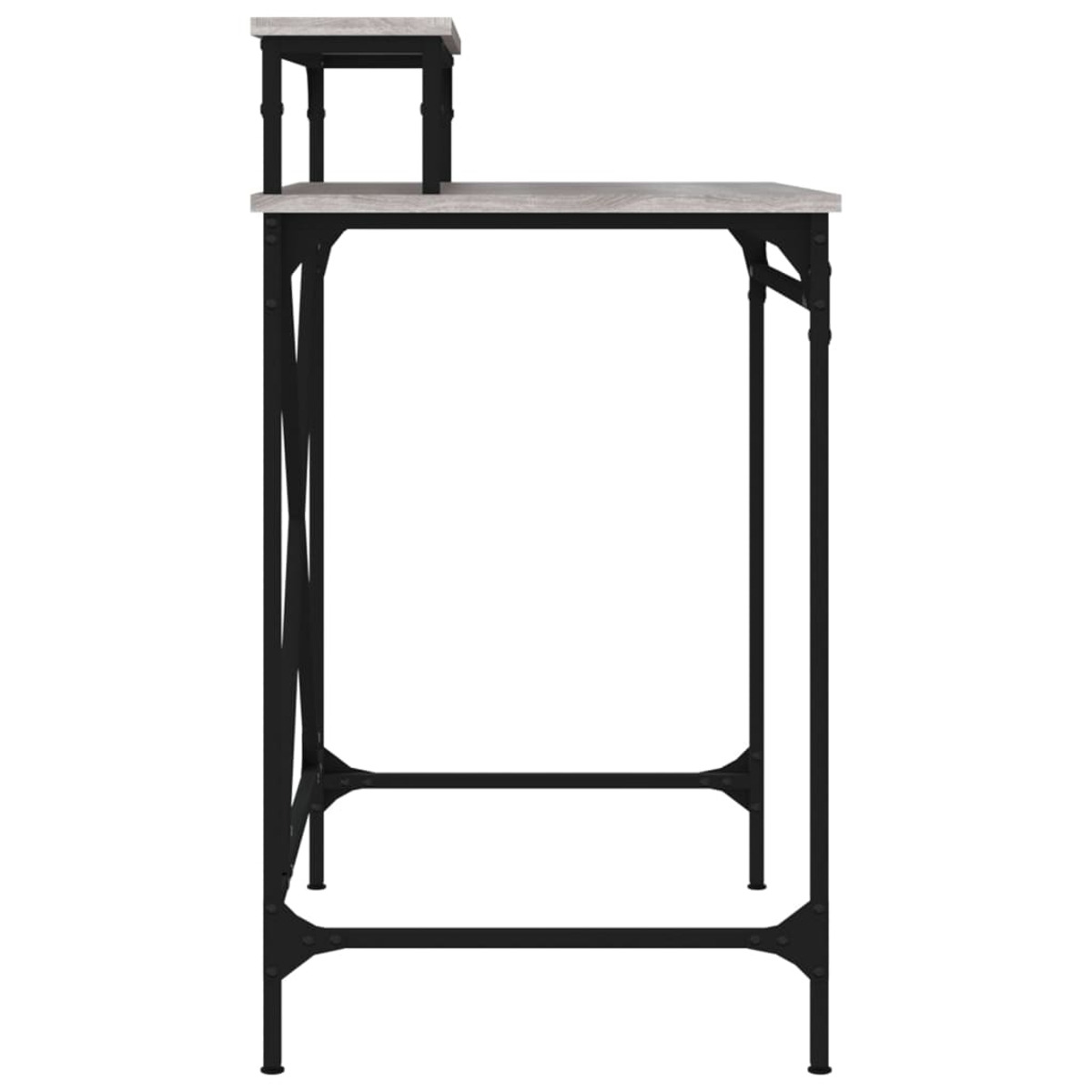 Hoher, schwarzer Metallschreibtisch mit kleinem grauem oberem Regal. Oben eine kleine graue Fläche.