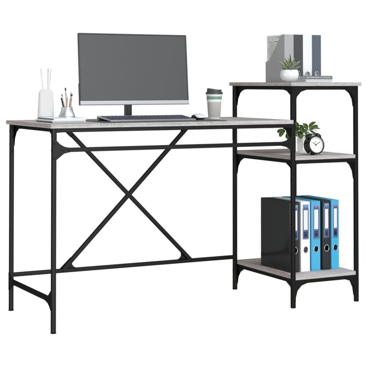 Schreibtisch mit heller Holzplatte, schwarzen Beinen und einem Regal. Ein Monitor und andere Gegenstände stehen oben.