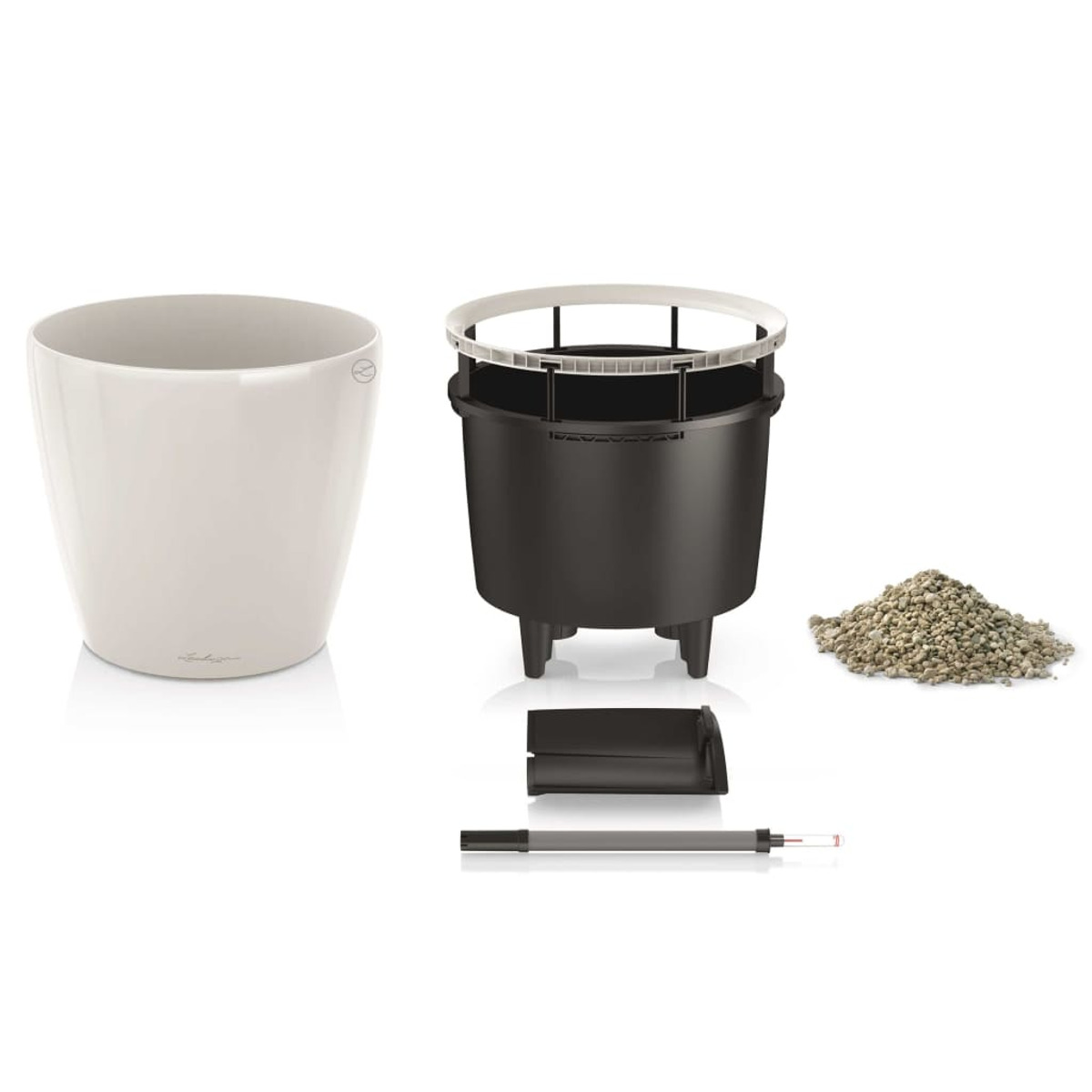 Un kit de jardinière avec des pièces et du gravier.