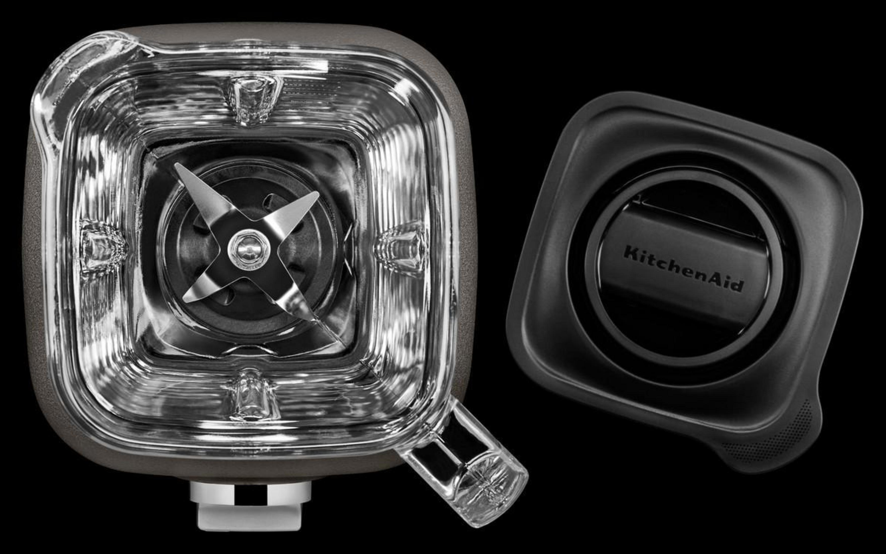 Top view of a blender. It's open, showing the blades and interior.