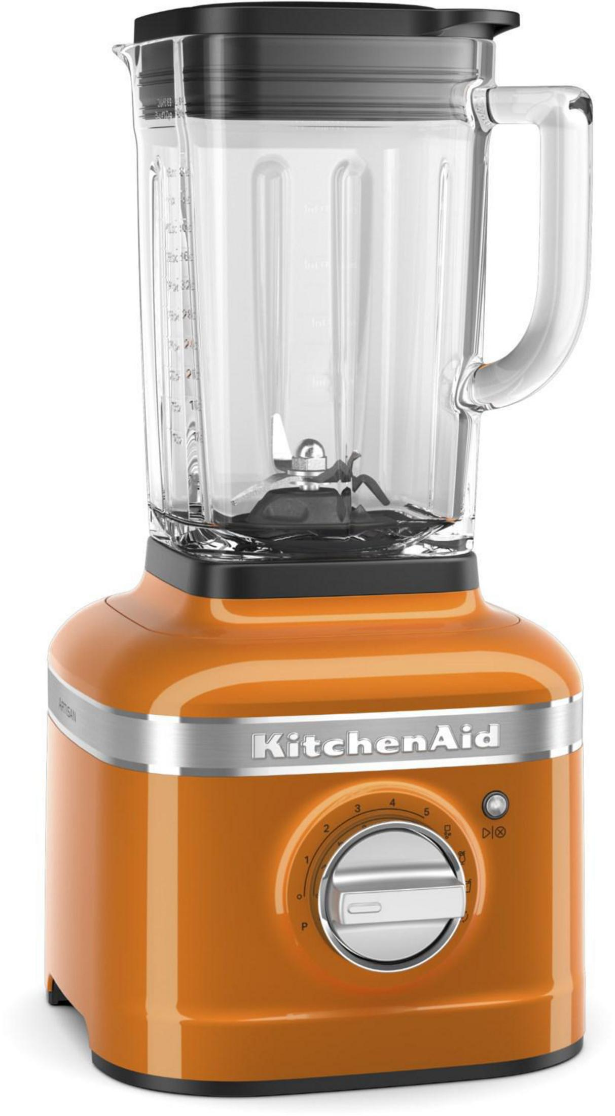 A KitchenAid blender in orange. It has a base with a dial, a glass jar, and a black lid.