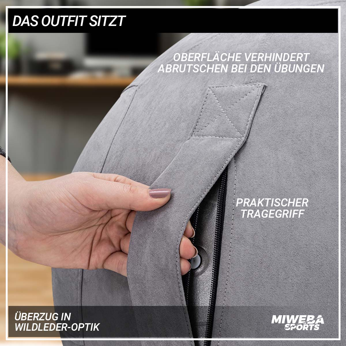 Grauer Ballstuhl, eine Hand greift nach einem Reißverschluss an der Seite.