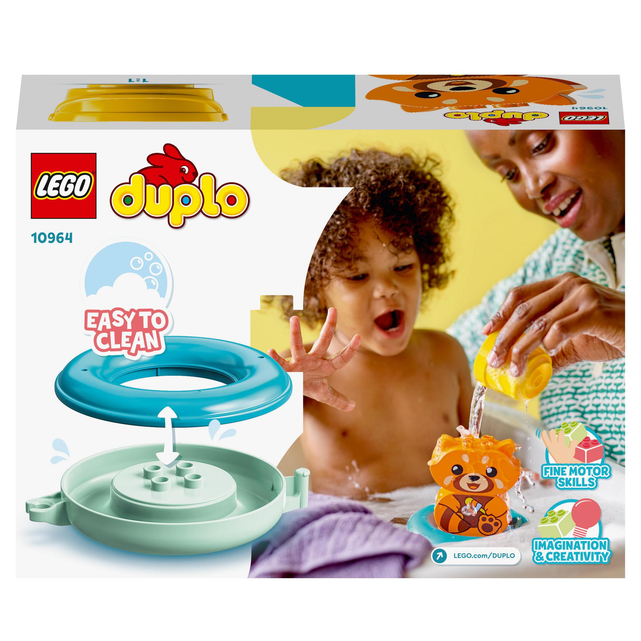 Set Lego Duplo con un bambino e un adulto che giocano. Include un anello blu e un giocattolo arancione.