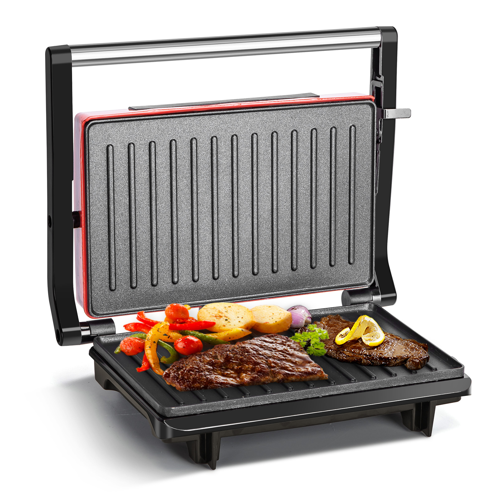 Parrilla roja abierta con comida: bistec, verduras, limón.