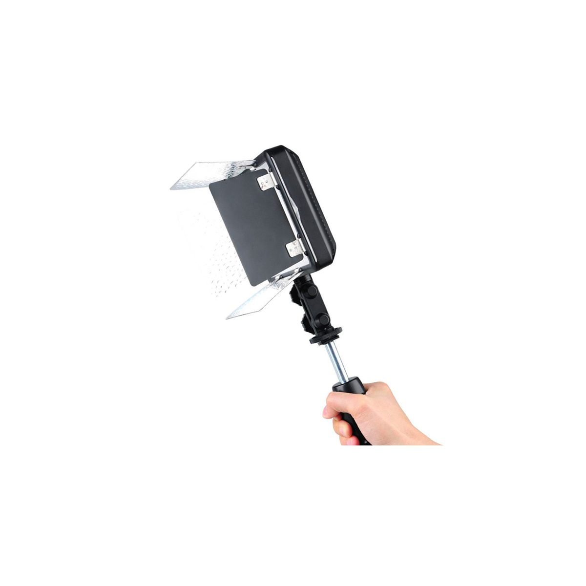 Eine Hand, die ein kleines LED-Licht hält.