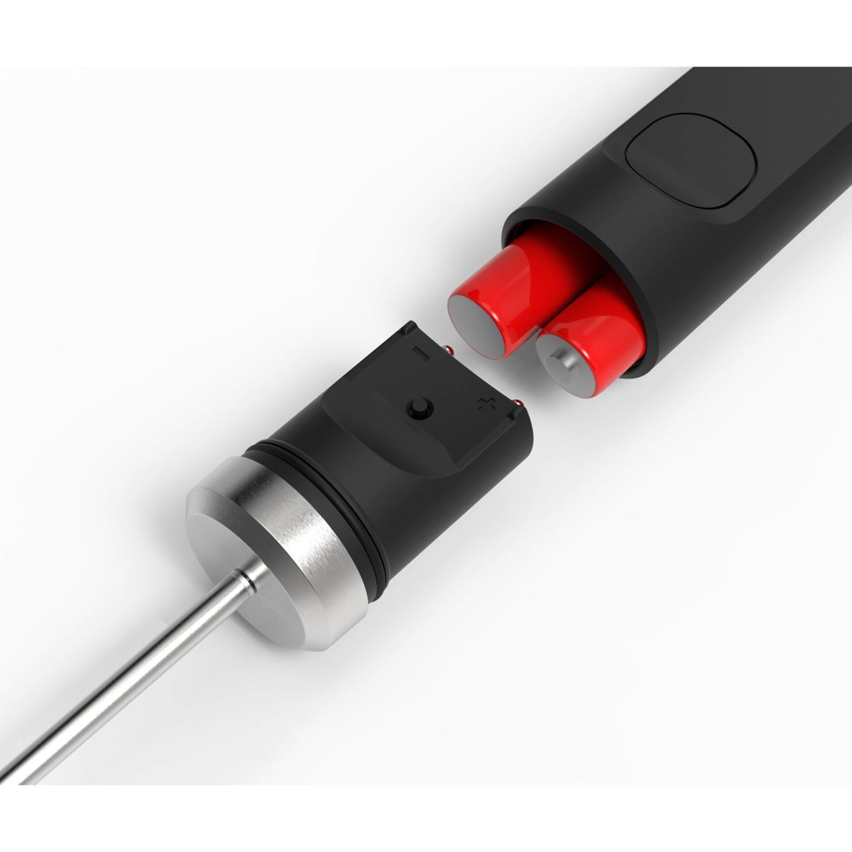 Ein schwarzes Gerät mit roten Batterien und einer Metallsonde. Das Gerät wird zerlegt, wobei die Batterien sichtbar sind.