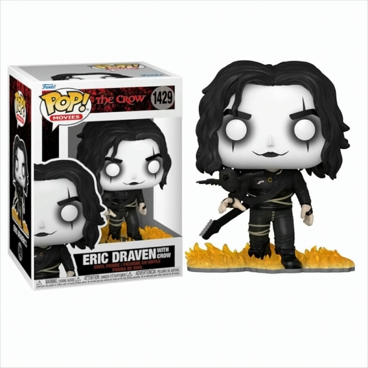 Eric Draven Pop-Figur mit Krähe, Box im Hintergrund. Figur hat schwarze Haare, weißes Gesicht.