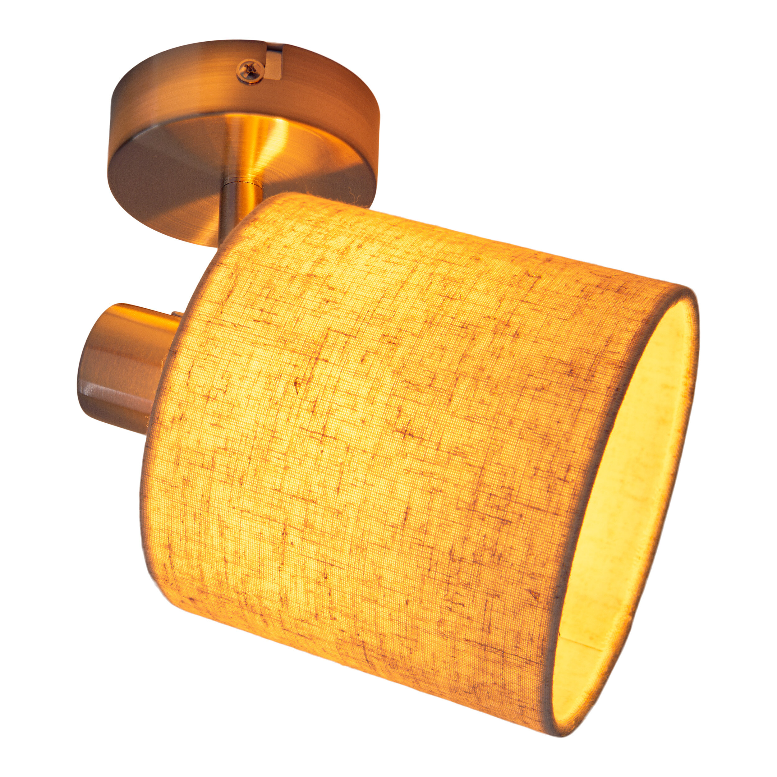 Eine Strahlerlampe mit Messing-Finish. Sie hat einen zylindrischen Schirm mit strukturierter Oberfläche.