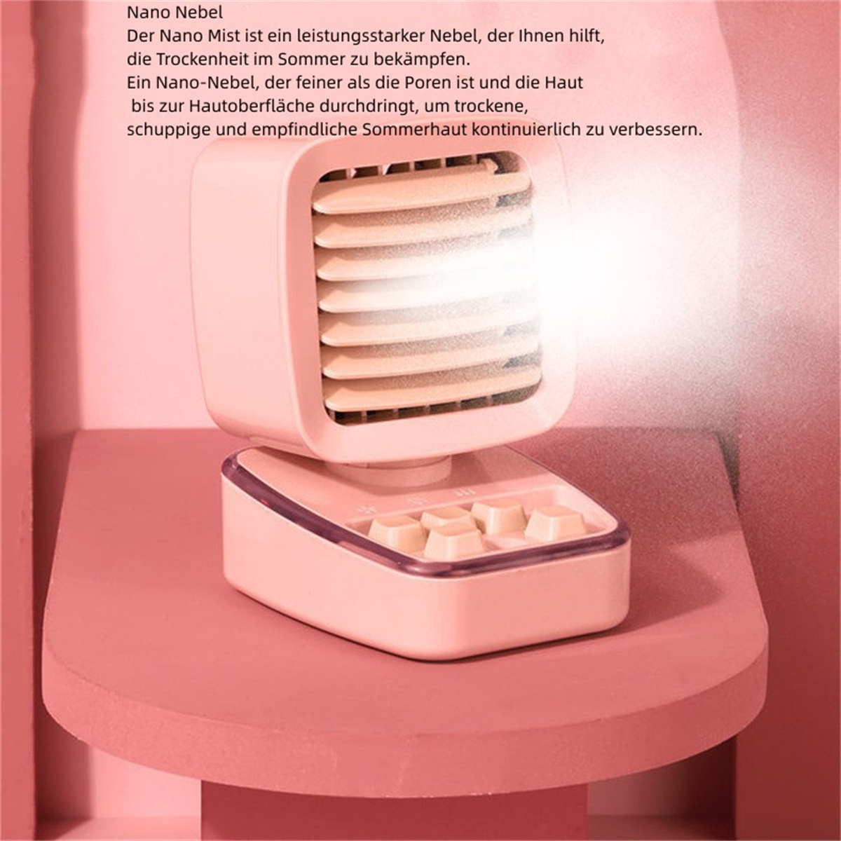 Weiß-rosa Nano Mist-Gerät auf rosa Oberfläche. Text über das Gerät ist vorhanden.