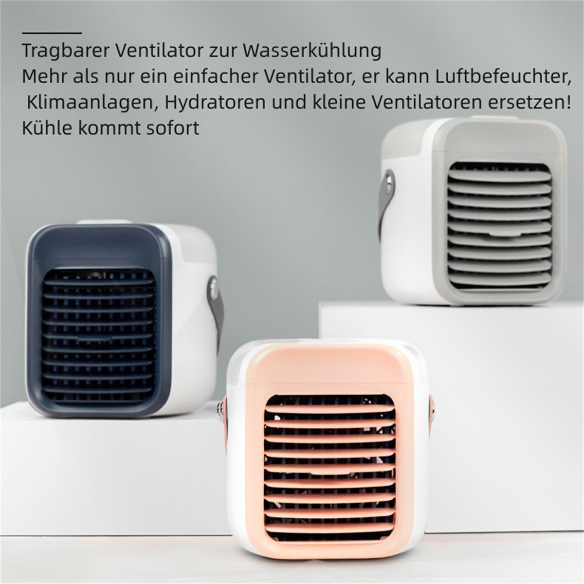 Drei tragbare Luftkühler in Weiß, Marineblau und Rosa.