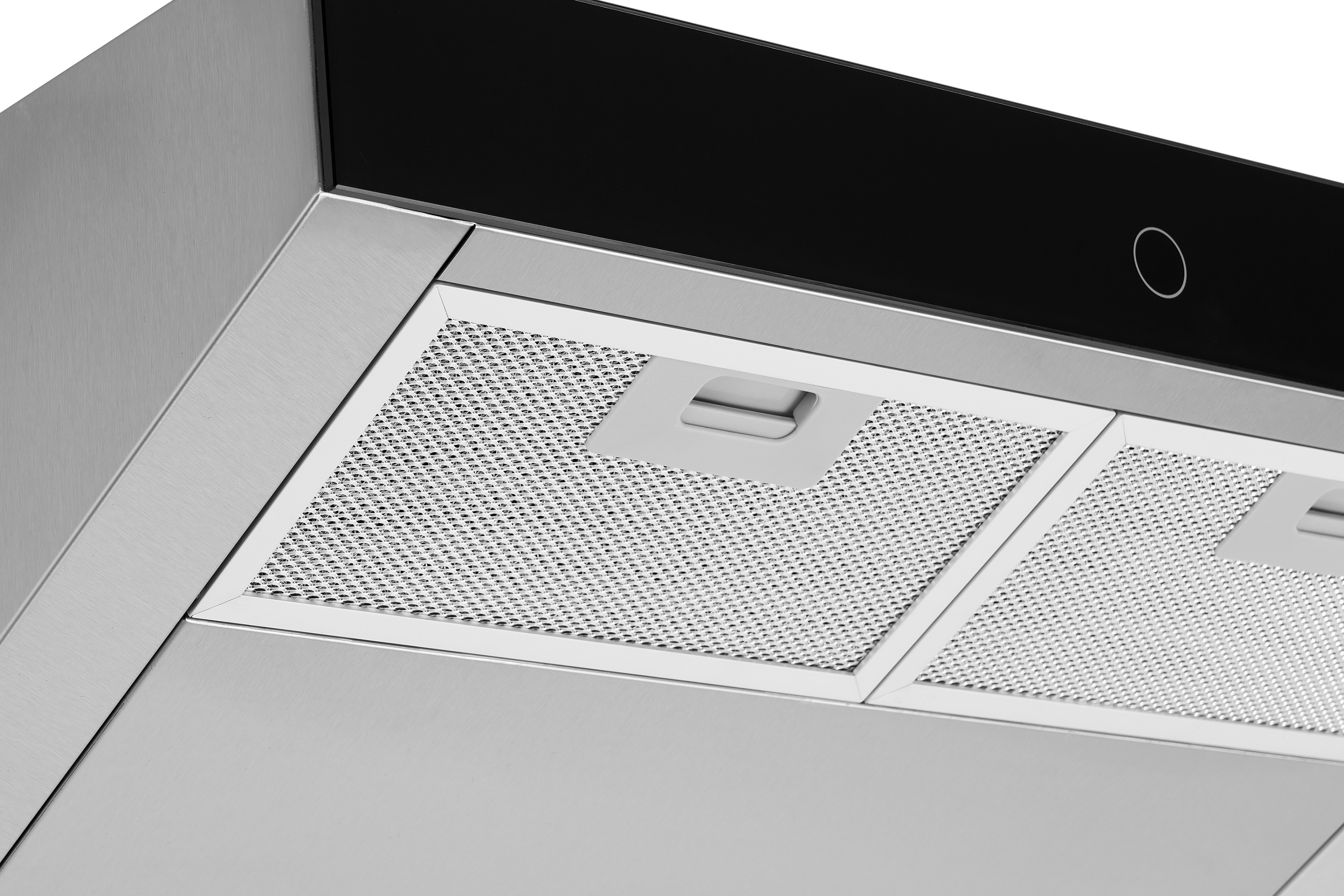 Close-up of a kitchen hood's filters and black glass panel. Stainless steel frame surrounding the filters.