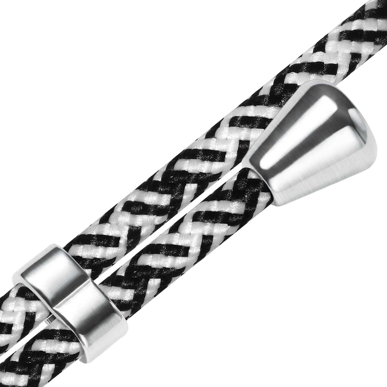 Geflochtenes schwarz-weißes Kabel mit silbernen Metallanschlüssen. Zickzack-Muster.