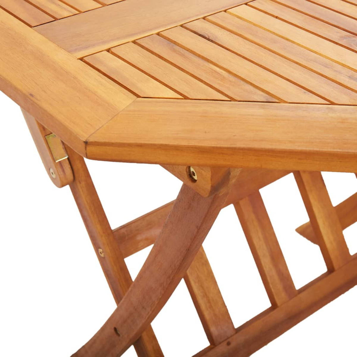 Nahaufnahme einer Holztischecke. Der Tisch hat eine hellbraune Farbe und ist aus Holzplanken gefertigt.