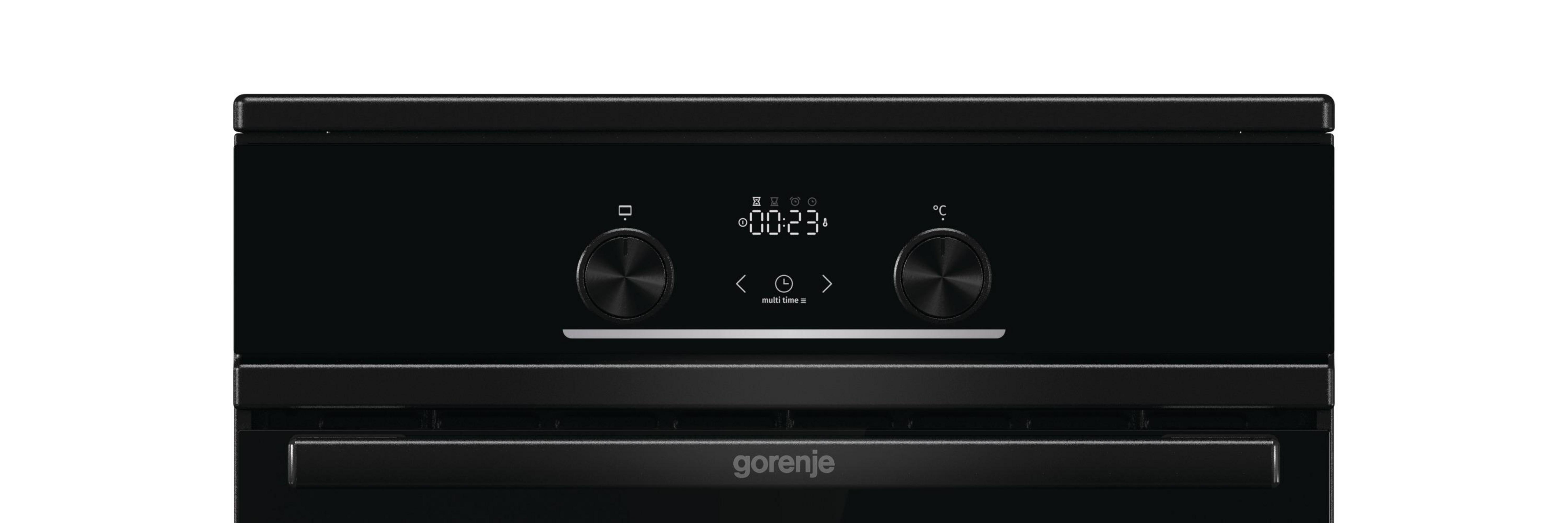 Panneau de commande de four noir. Boutons, affichage numérique indiquant l'heure. Logo Gorenje en bas.