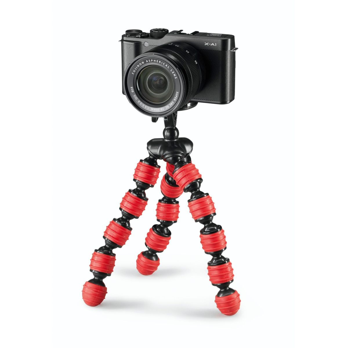 Czarny aparat na elastycznym statywie. Czerwone i czarne nogi. Białe tło.