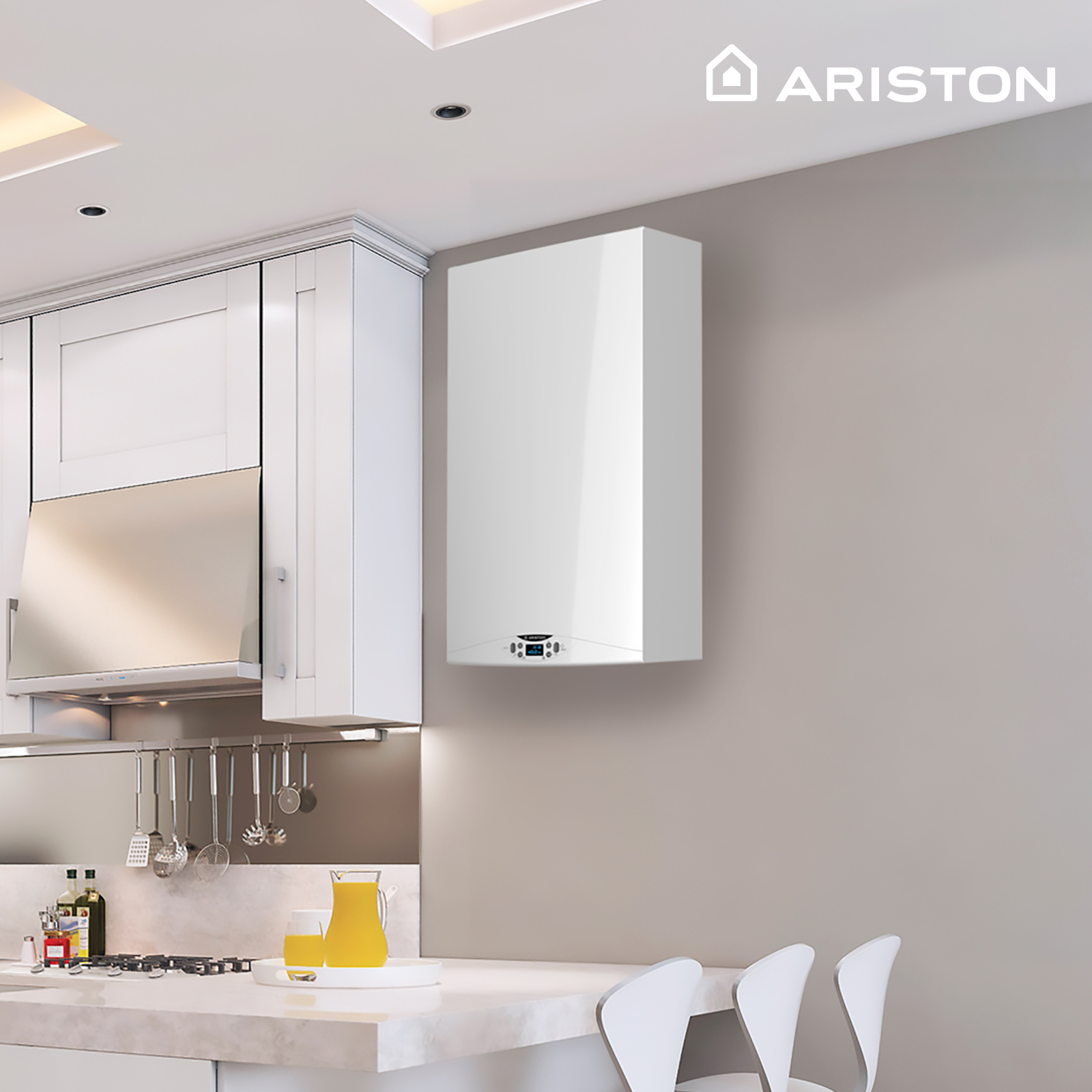 Una caldera de gas Ariston blanca montada en la pared en un entorno de cocina, con una pared de tono neutro y armarios blancos.