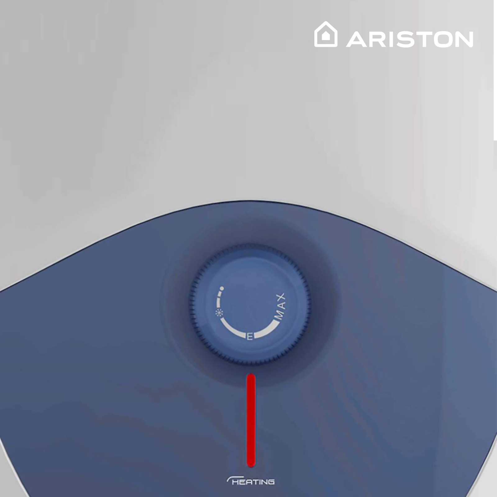 Primer plano de un dial de control de calentador de agua azul con un indicador de calefacción rojo.