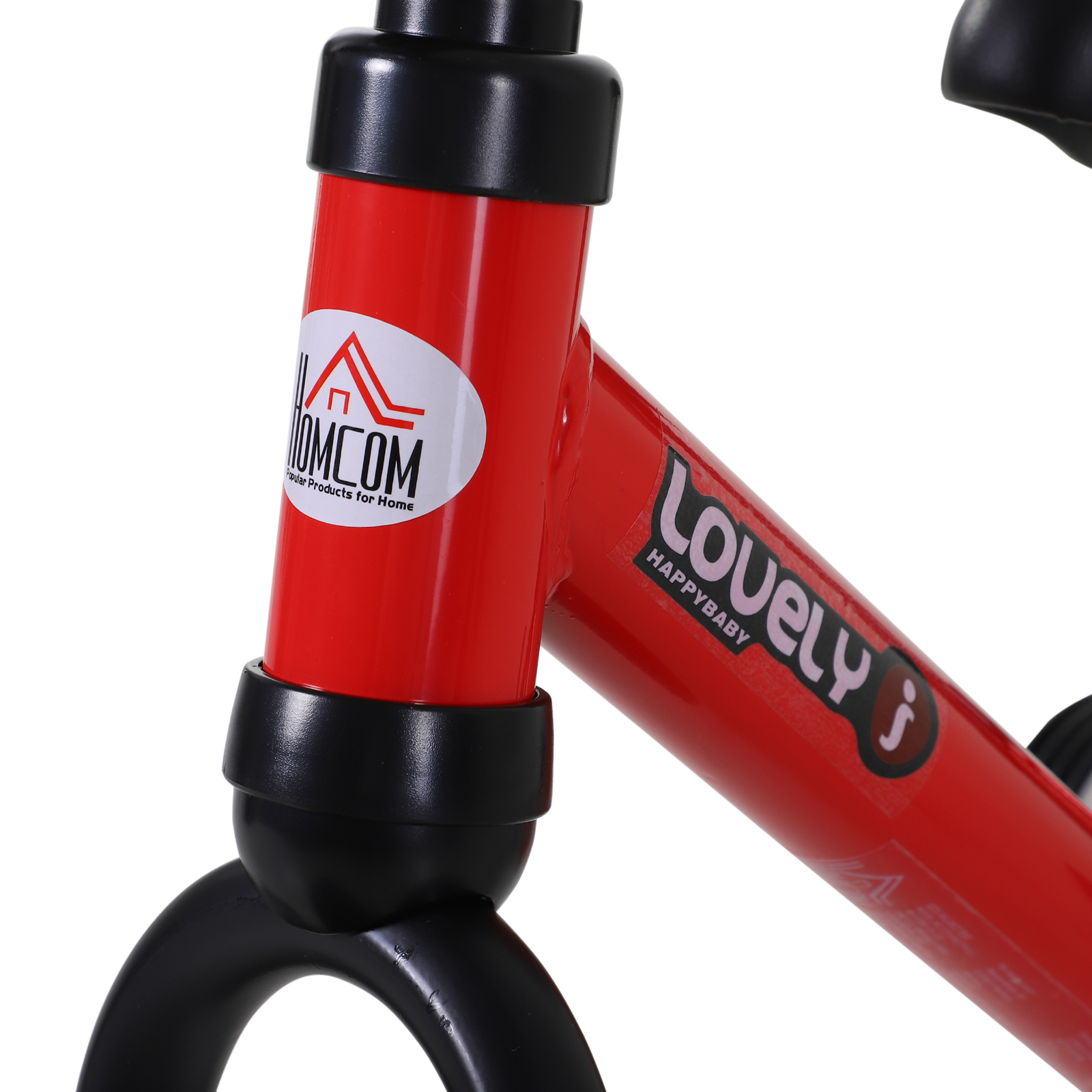 Primer plano de un cuadro de bicicleta de equilibrio rojo, con el nombre de la marca Lovely Happybaby.