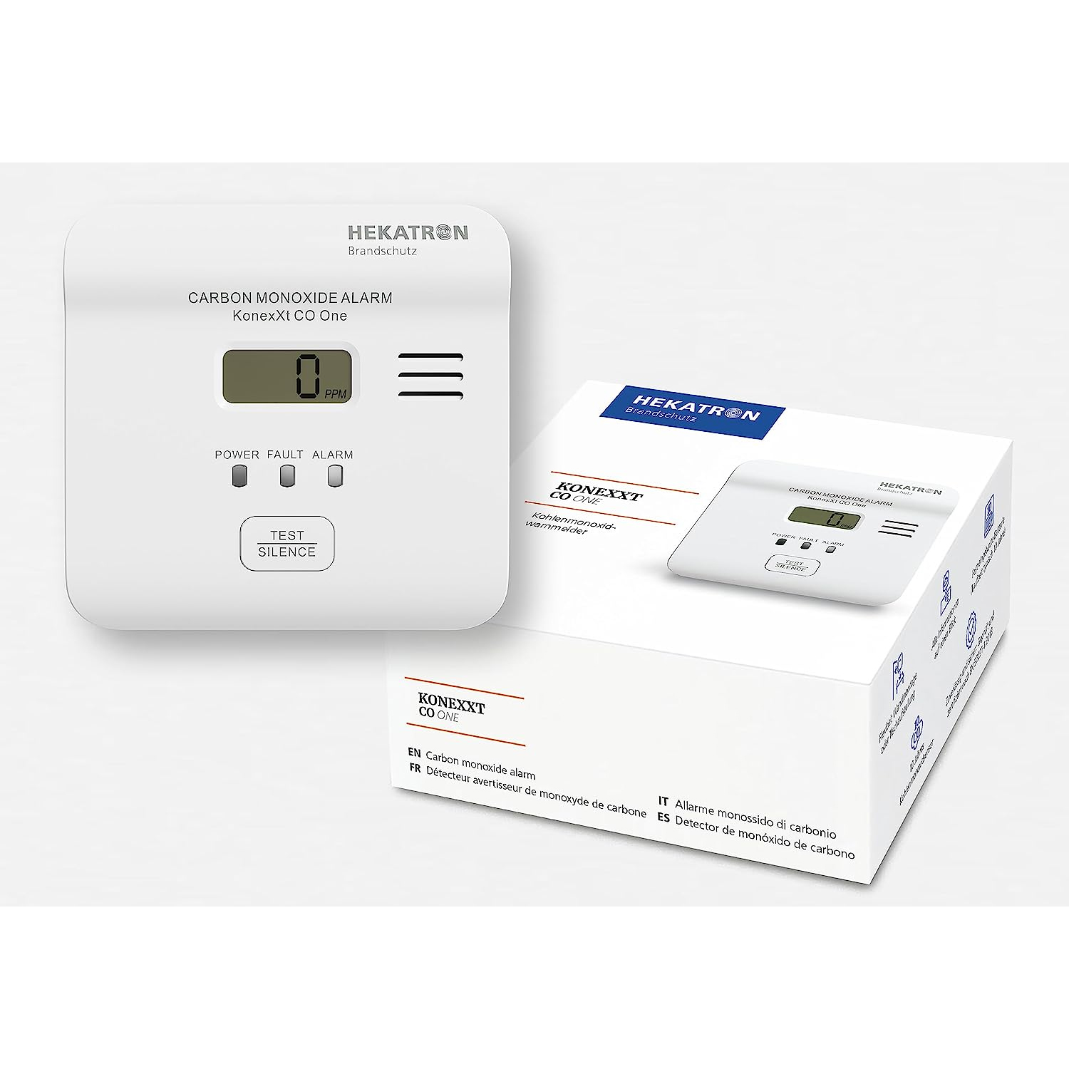 Ein weißer Kohlenmonoxid-Melder und seine Box, mit dem Wert 0 ppm auf dem Display.