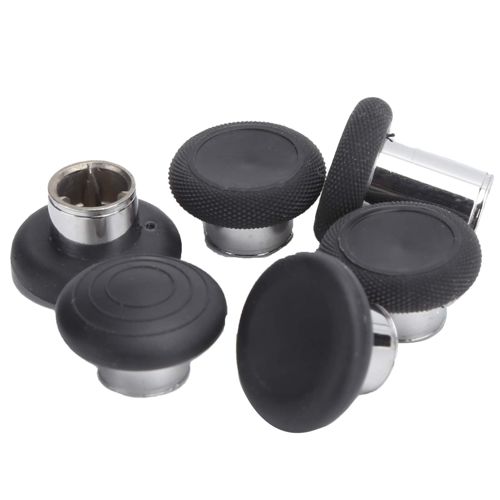 Een set van zes zwarte en zilveren joystick thumbsticks voor een gameconsole.