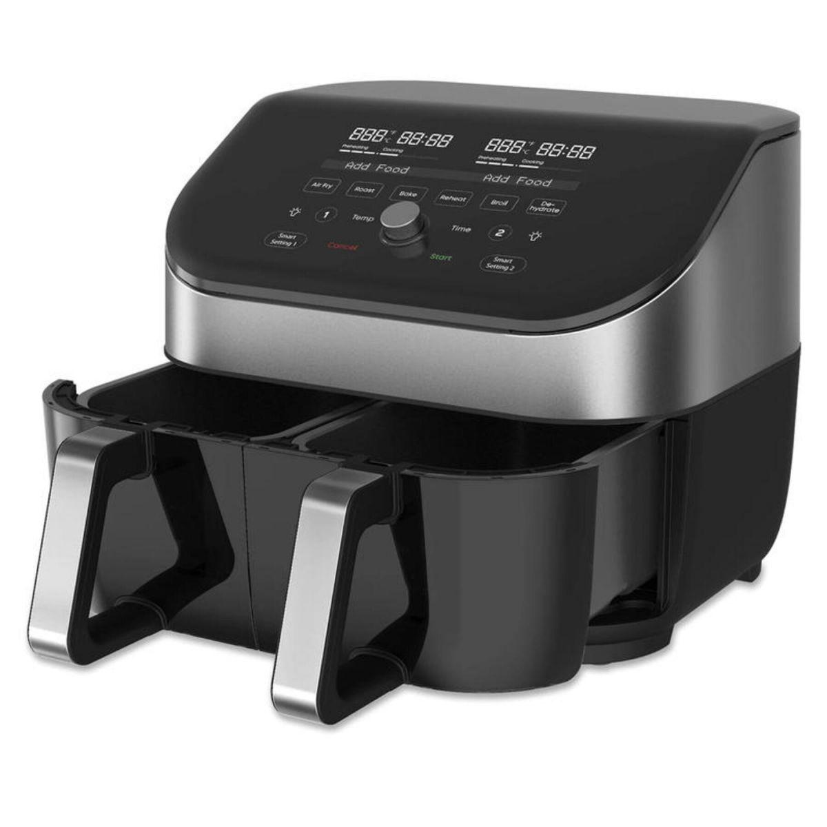 Black and silver air fryer with two compartments and control panels.
