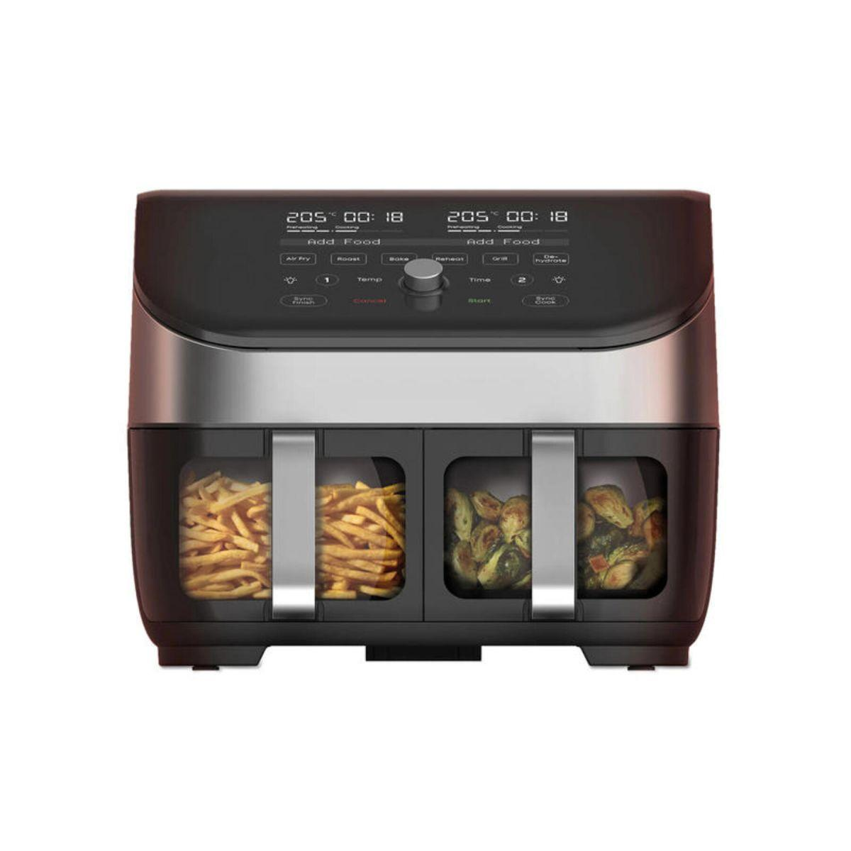 Air fryer with dual compartments, showing food inside, and control panel.