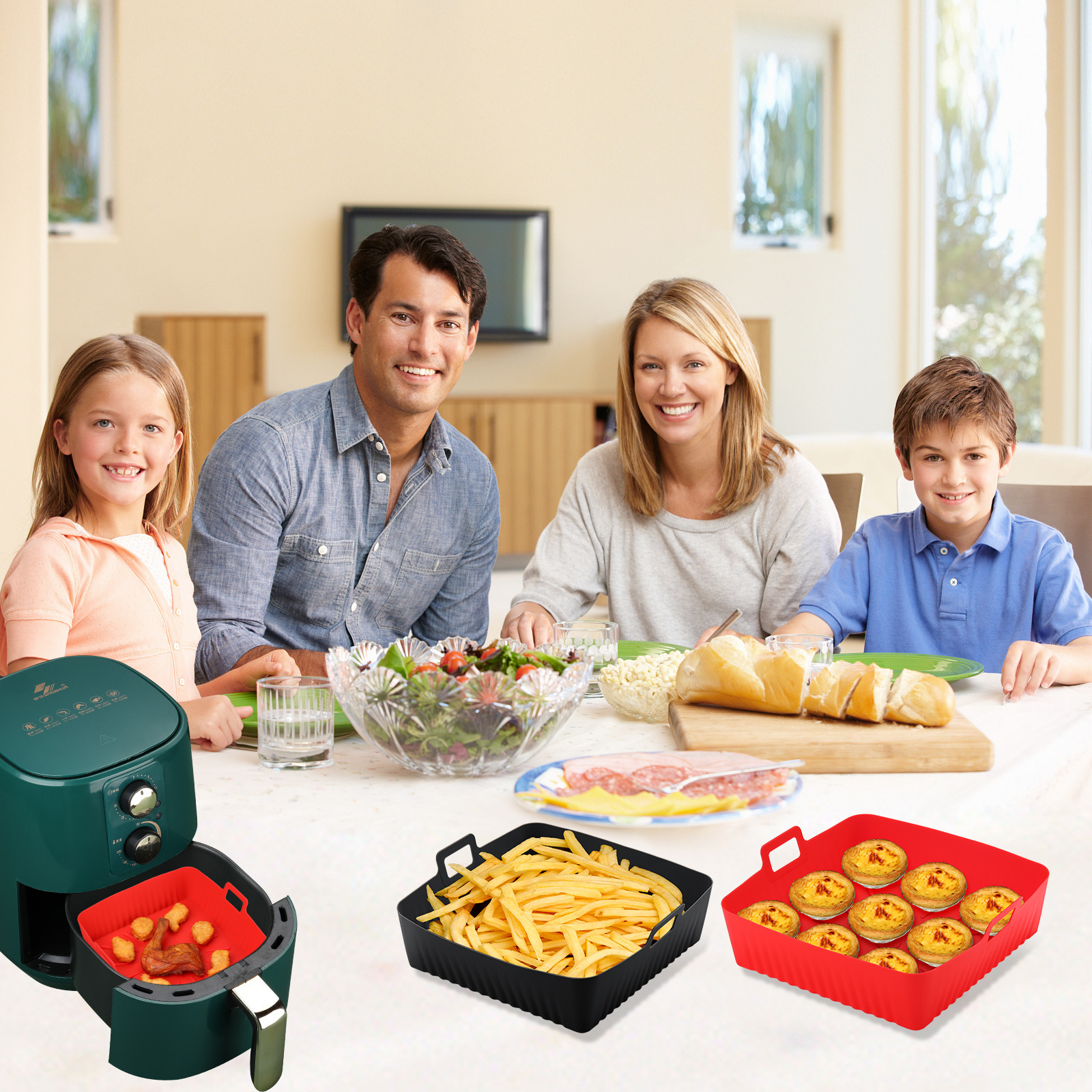 Family at table with food. Air fryer, fries, and tarts. Smiling faces. Bright room.