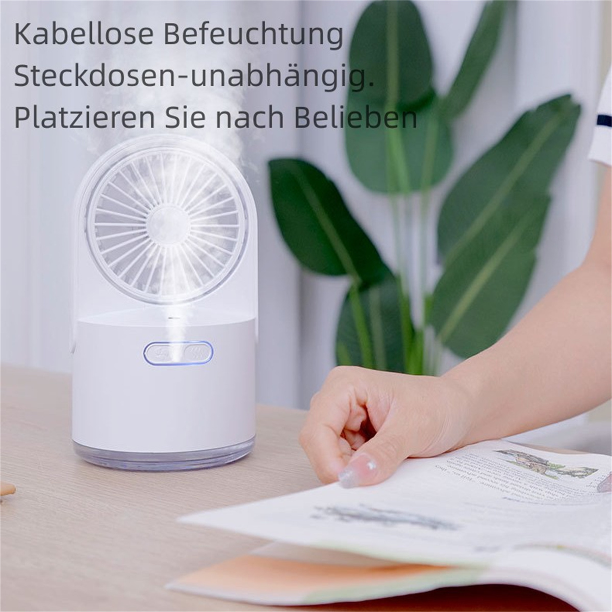 Weißer Luftbefeuchter mit Ventilator, eine Hand einer Frau und Text auf Deutsch.