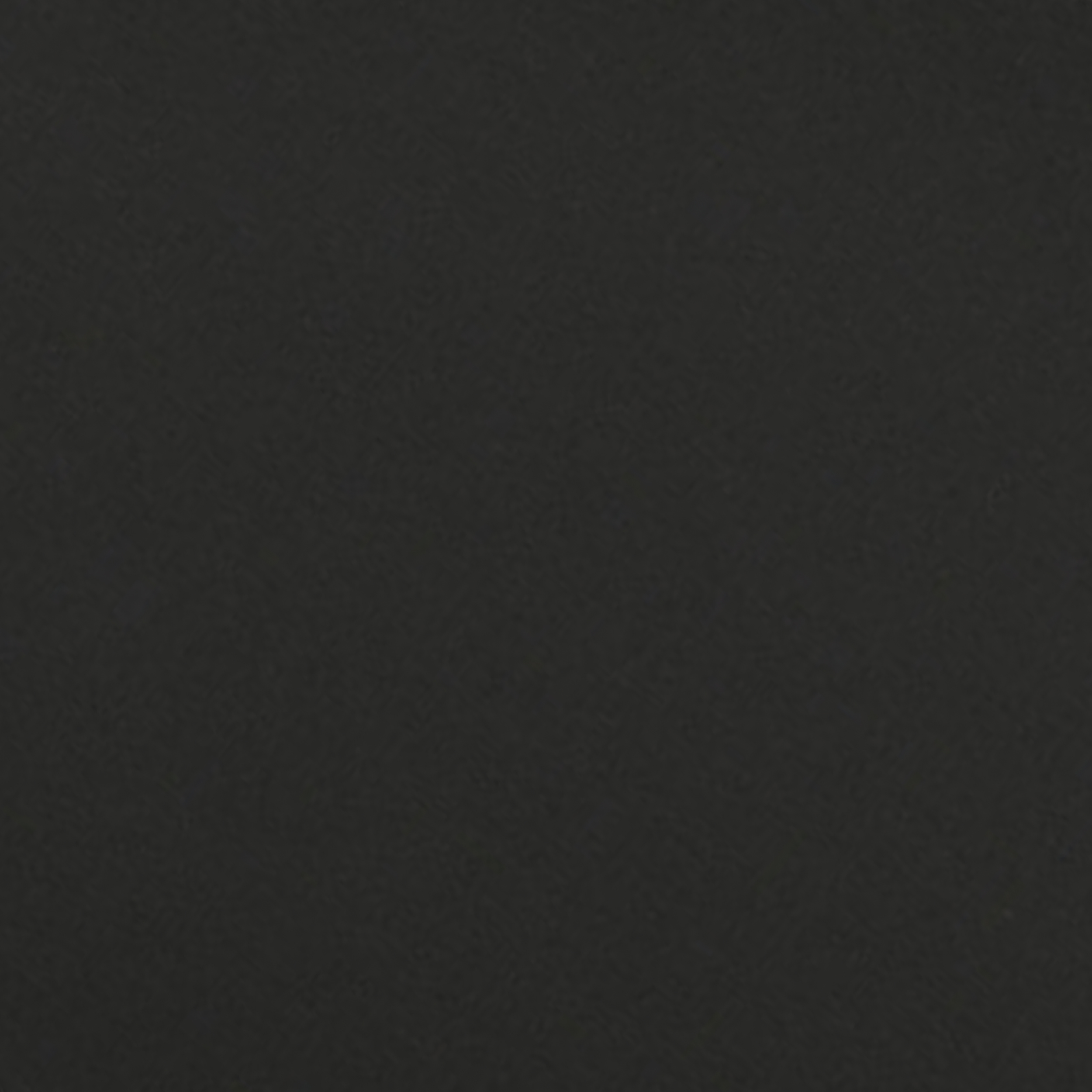 Einfarbige schwarze Oberfläche. Gleichmäßige Farbe, einfacher Hintergrund. Textur erscheint glatt.