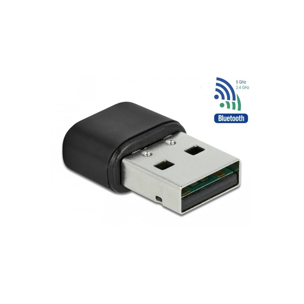 Un adattatore Bluetooth USB nero con sfondo bianco. Viene visualizzata un'icona Bluetooth.