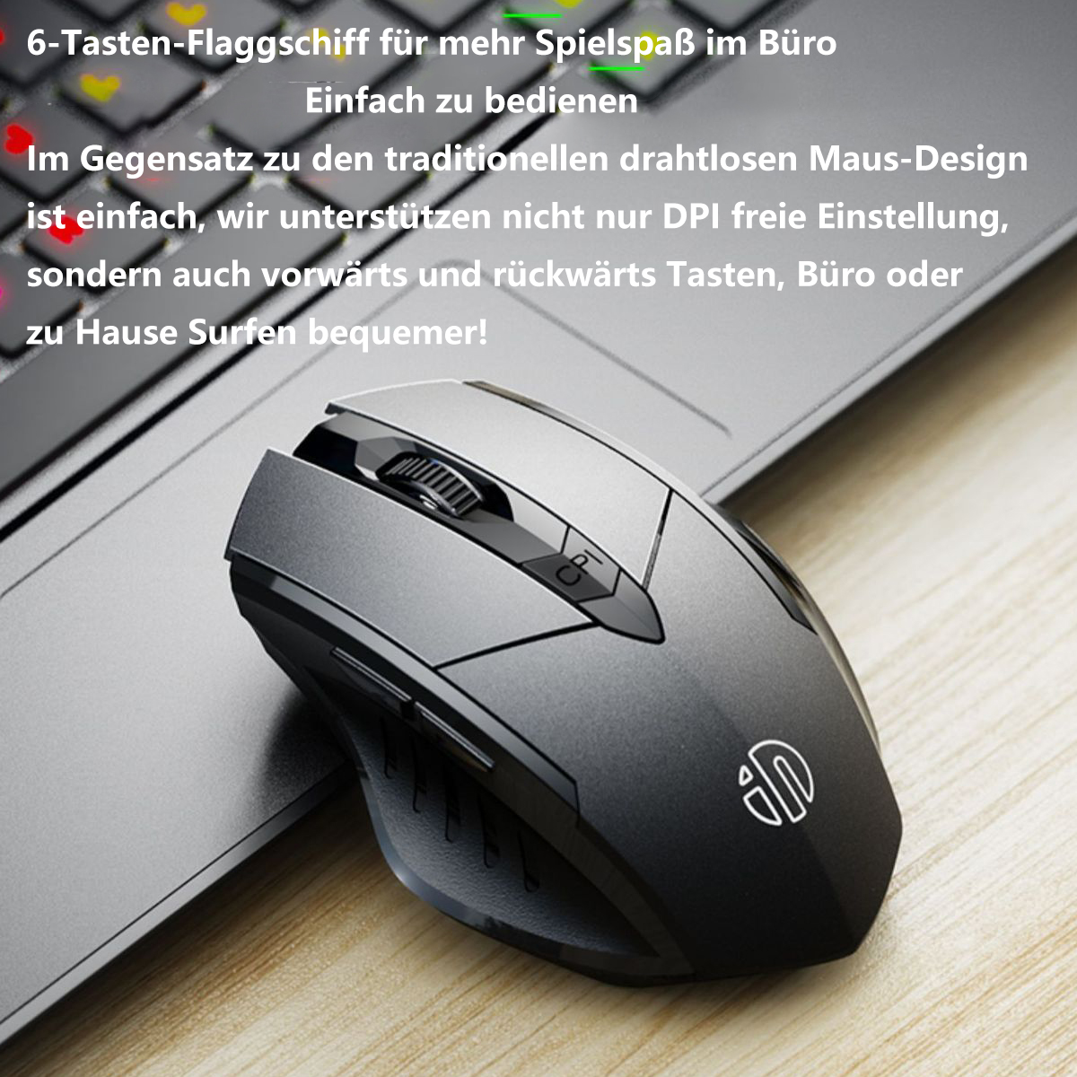 Computermaus auf einem Laptop, mit deutschem Text. Die Maus ist schwarz-grau mit mehreren Tasten.