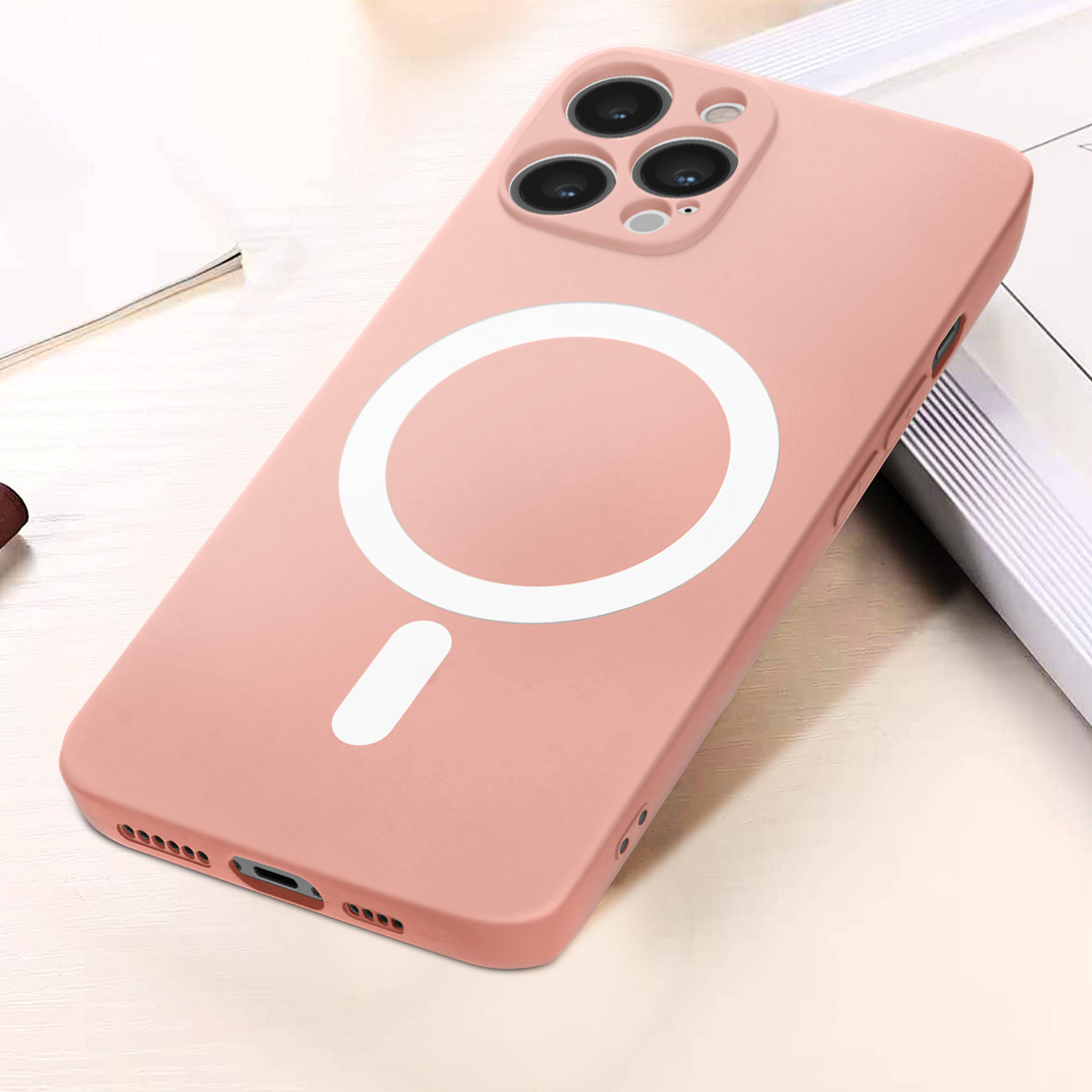 Una custodia per telefono rosa con un cerchio bianco e un segno meno, su uno sfondo bianco.