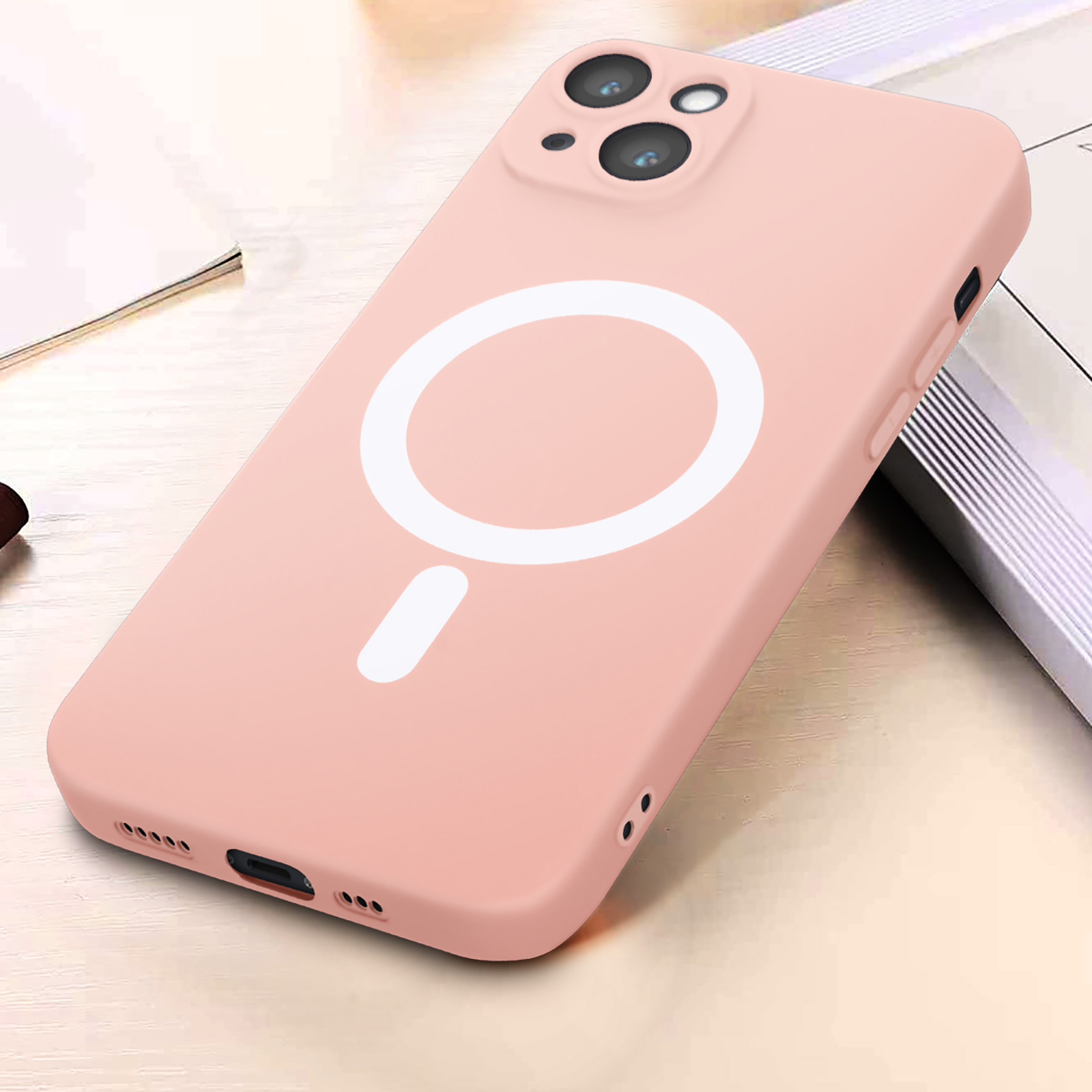 Custodia rosa per telefono con cerchio bianco e simbolo meno, su una superficie di legno.