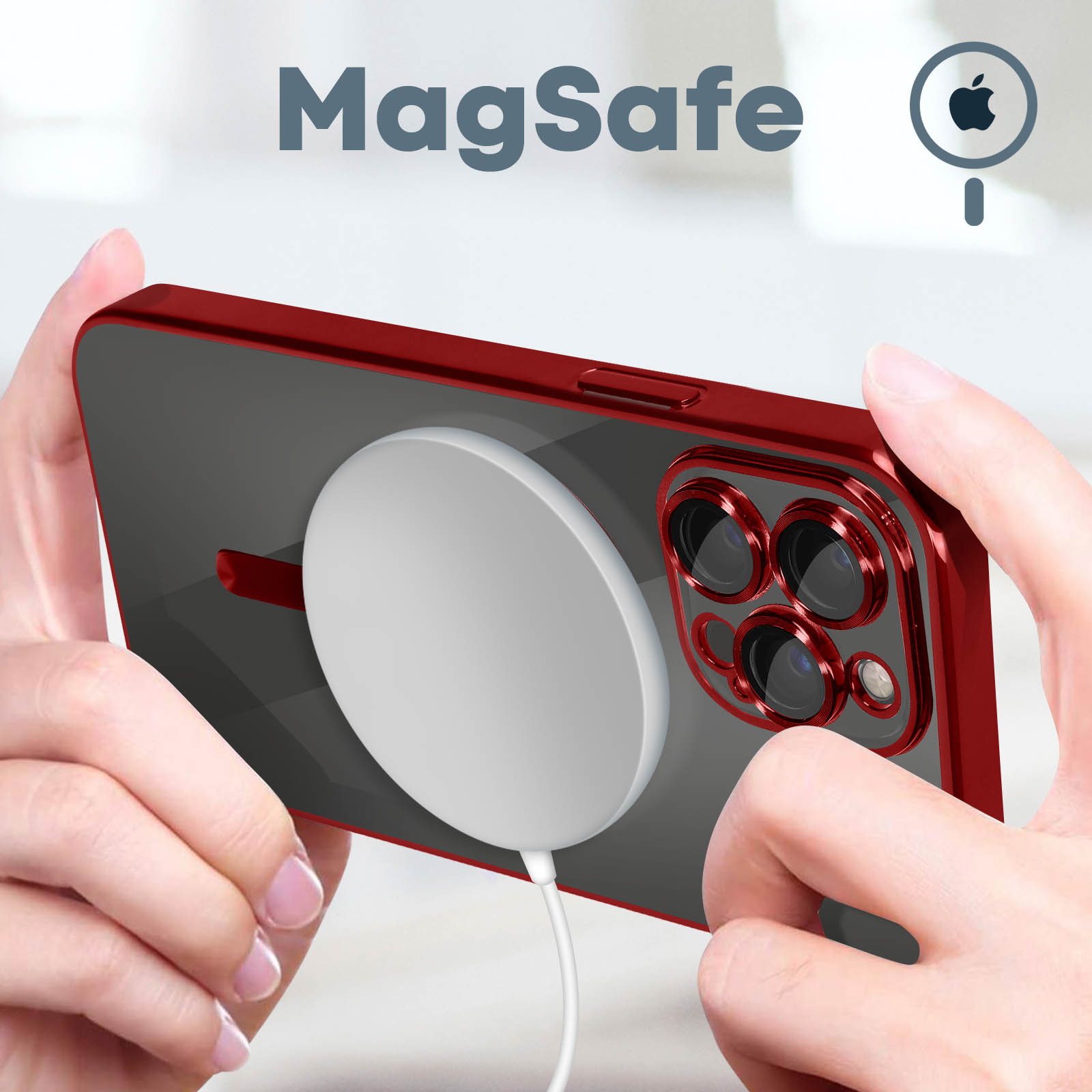 Une personne tenant un téléphone avec un étui rouge et un chargeur blanc.