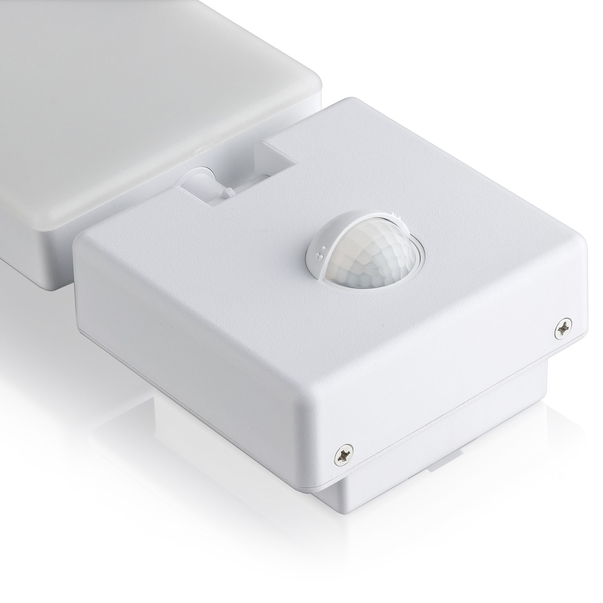 Weißes Bewegungssensorgerät, mit einem kuppelförmigen Sensor und sichtbaren Schrauben.