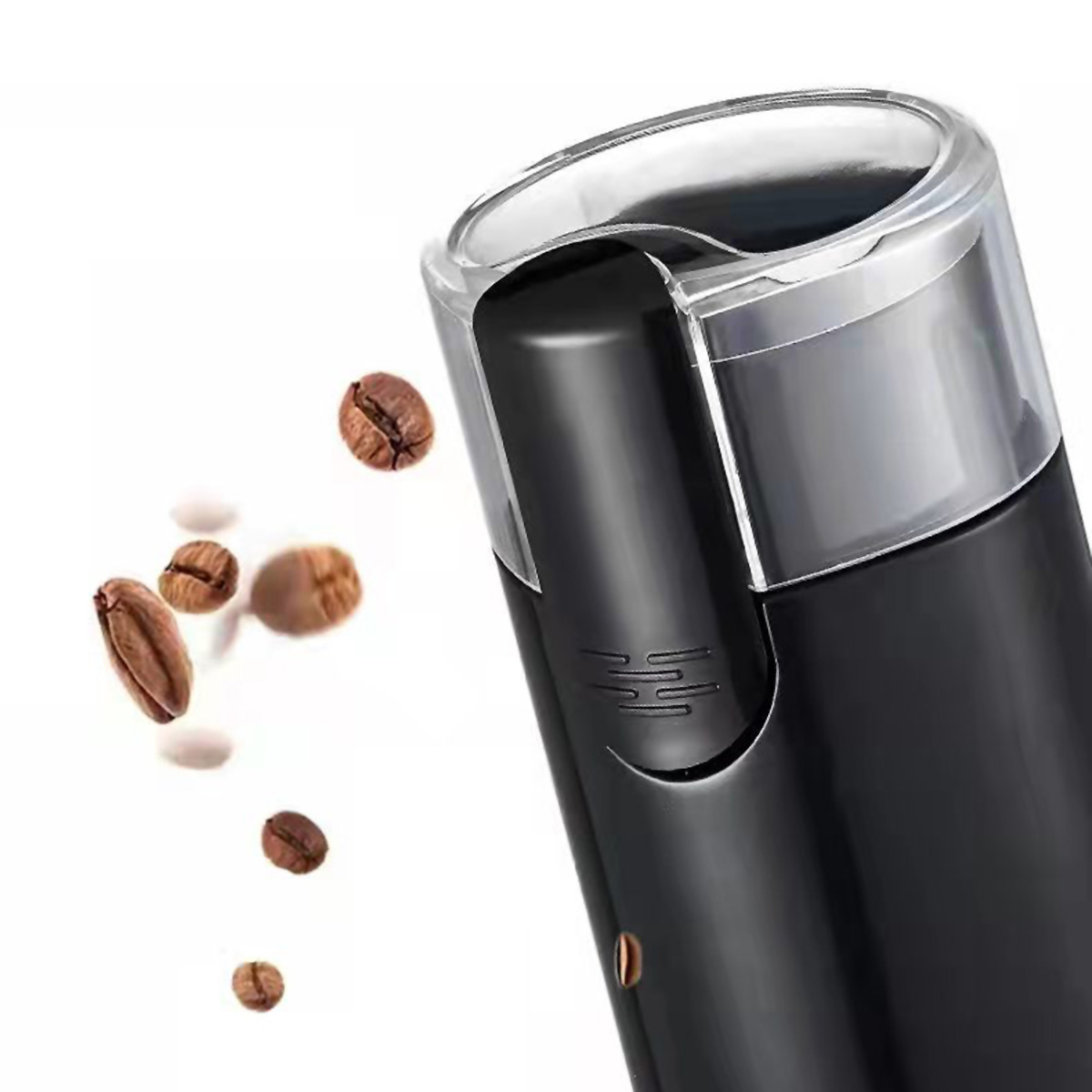 Molinillo de café negro con tapa transparente, granos de café en el aire.