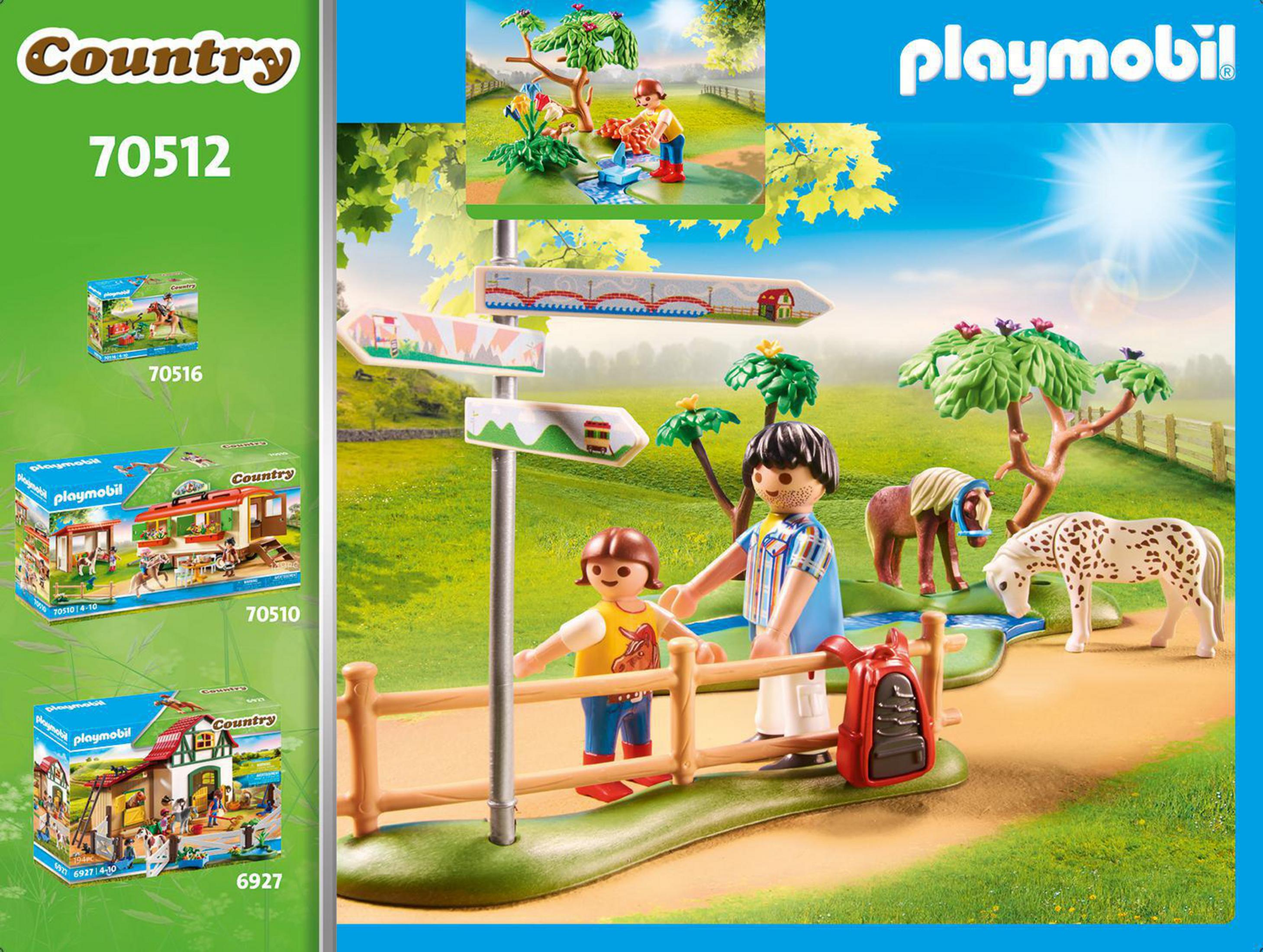 Scena del set Playmobil con personaggi, animali e un cartello stradale.