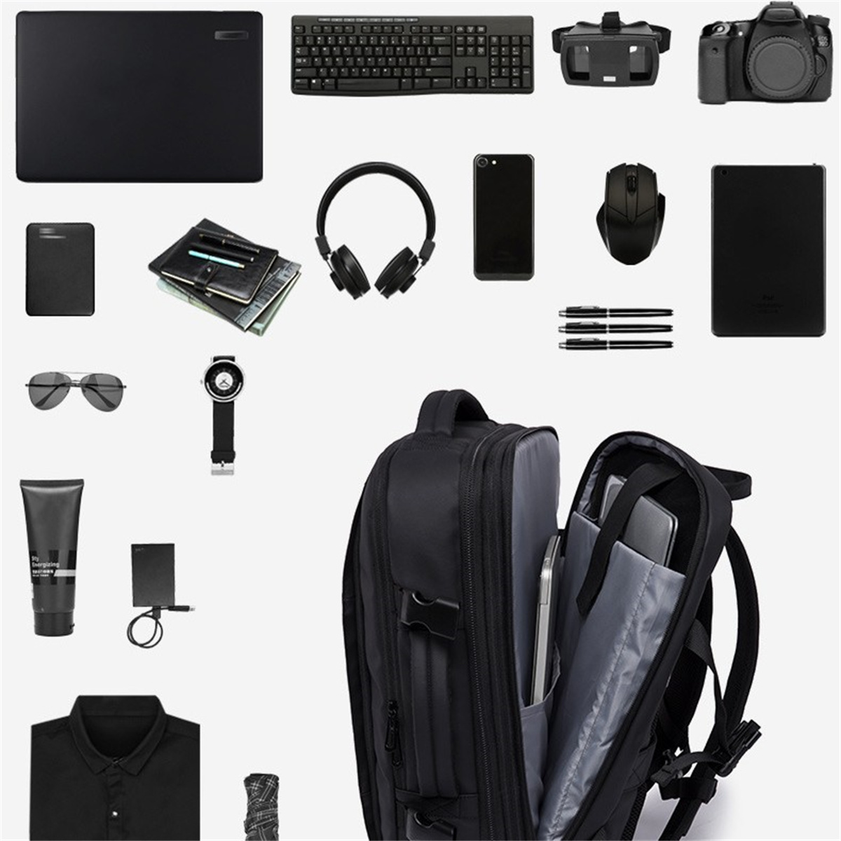 Eine Vielzahl schwarzer technischer Artikel, darunter ein Rucksack und eine Kamera.