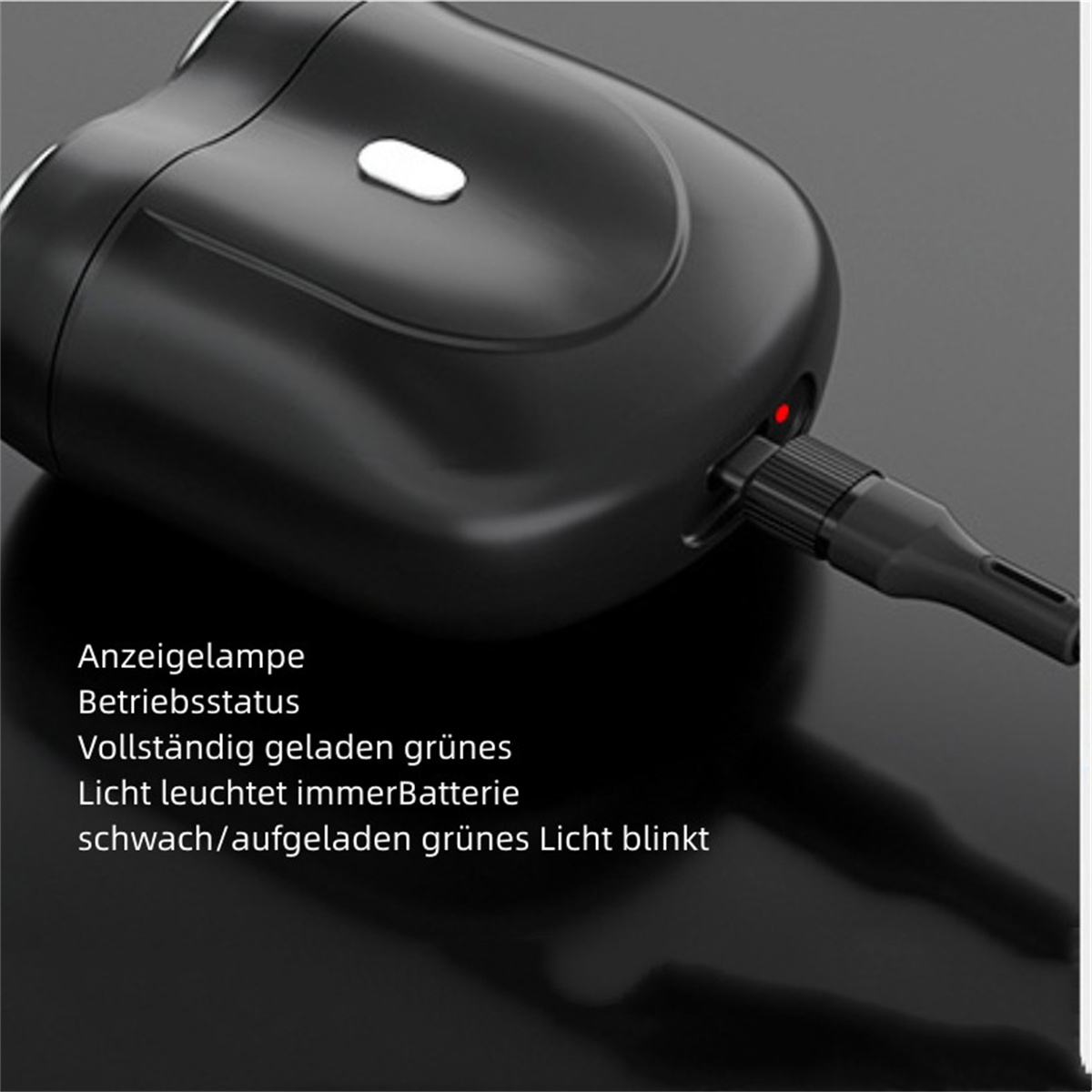 Schwarzes Gerät mit Lichtanzeigen. Der Text ist auf Deutsch und zeigt den Ladestatus des Geräts.