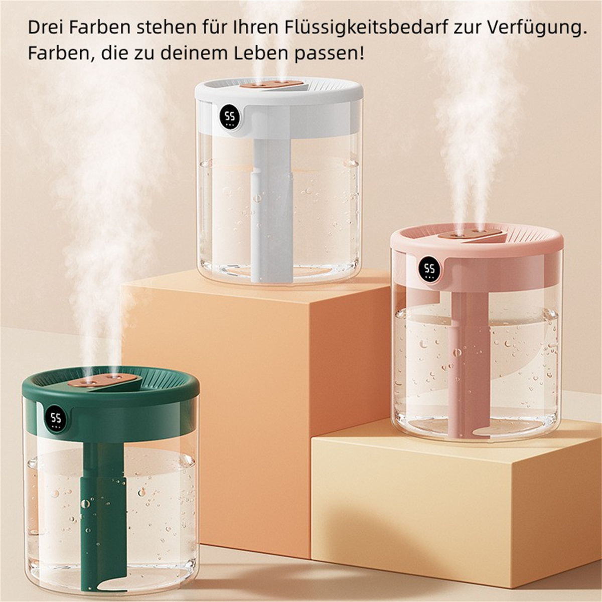 Drei Luftbefeuchter in Weiß, Rosa und Grün auf Podesten, mit aufsteigendem Dampf. Text auf Deutsch.