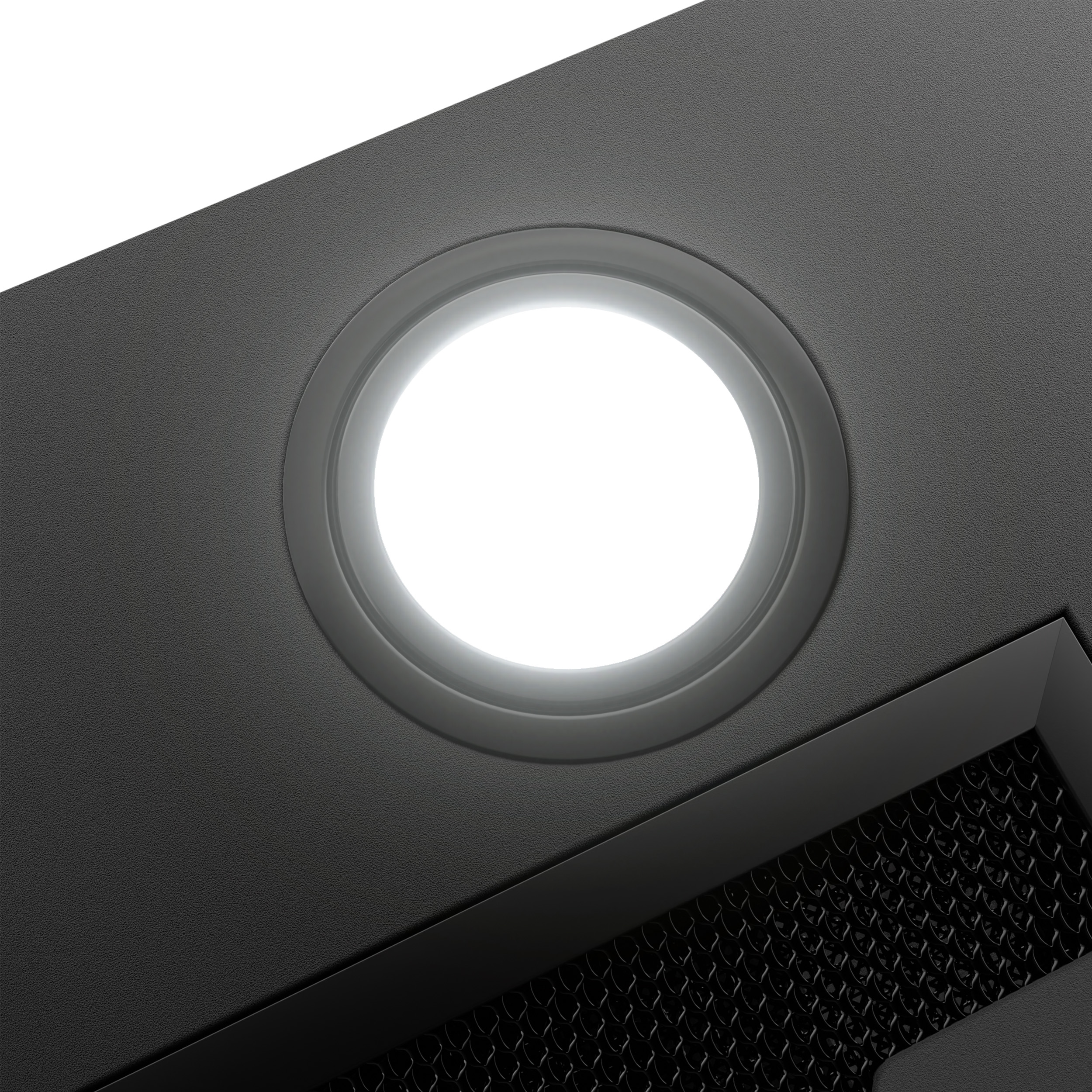 Close-up van een zwart afzuigkaplicht, een heldere cirkel van licht.