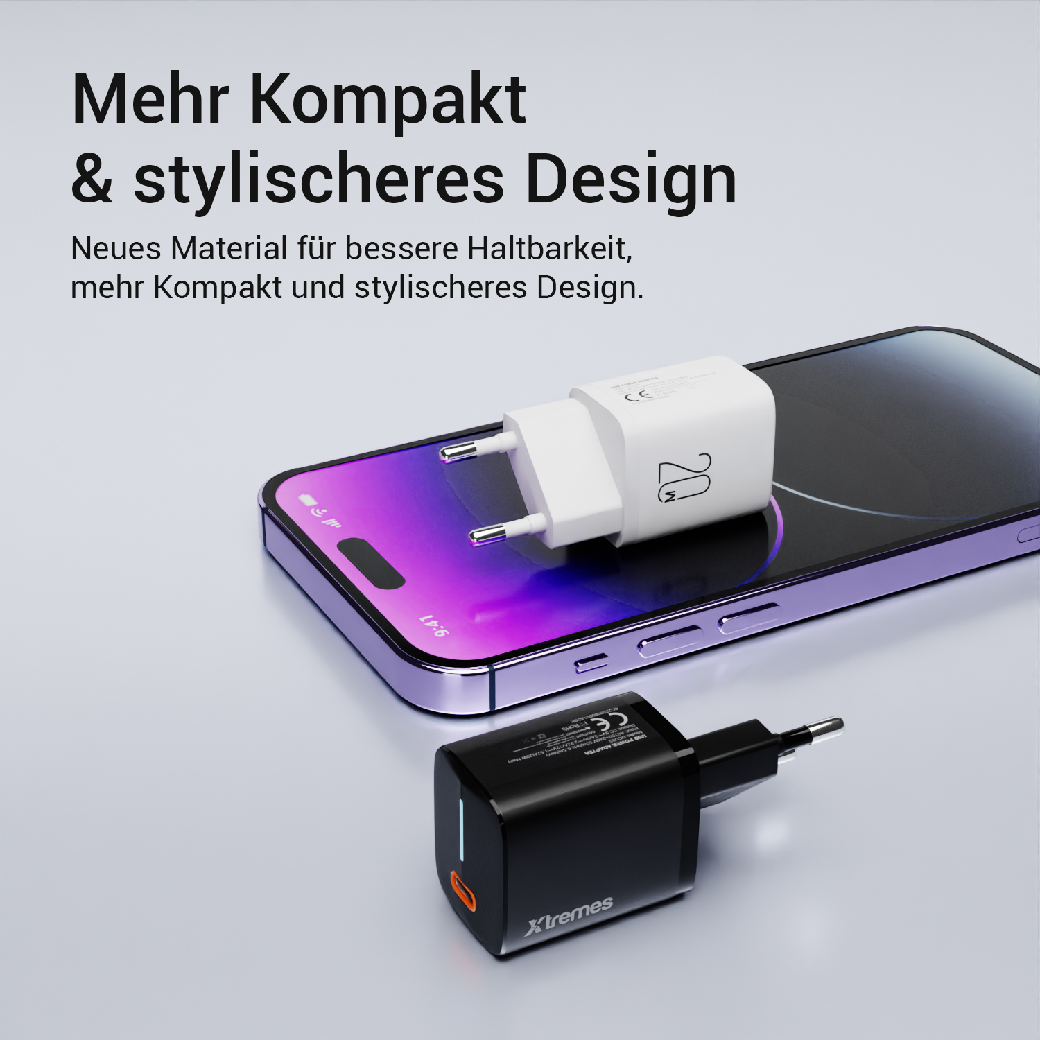 Zwei Ladegeräte: ein weißes auf einem Telefon und ein schwarzes. Text: 'Mehr Kompakt & stylischeres Design'.