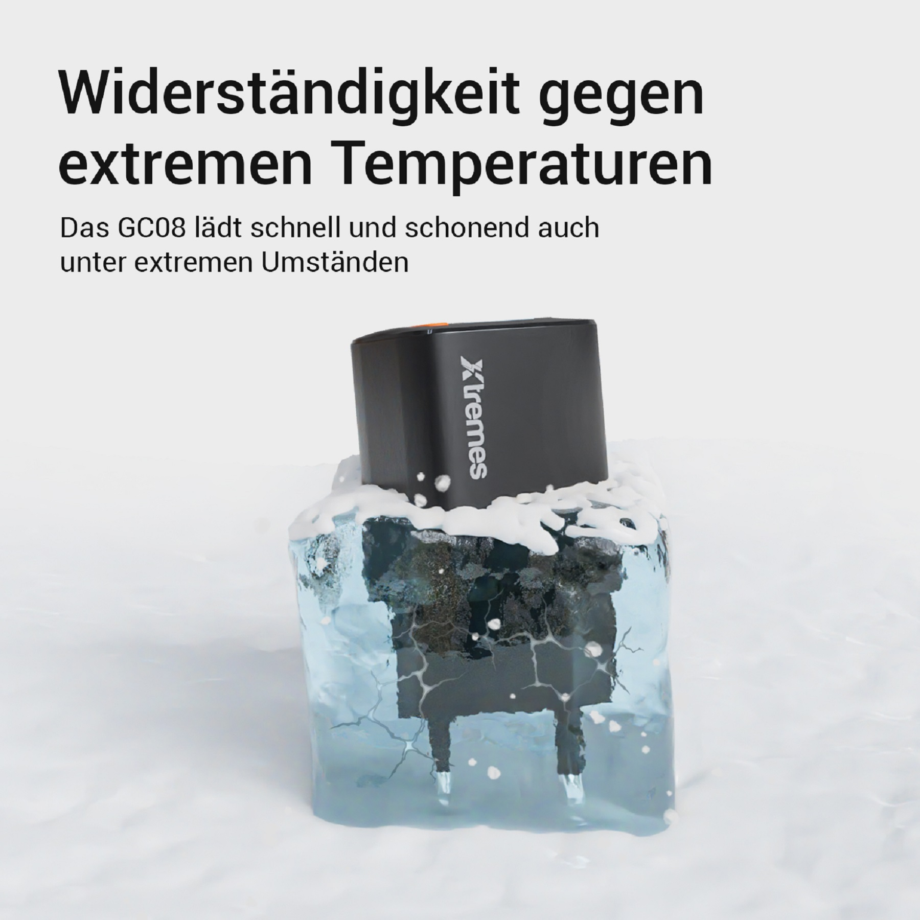 Schwarzes Ladegerät in Eis, mit Text über extreme Temperaturen, auf weißem Hintergrund.