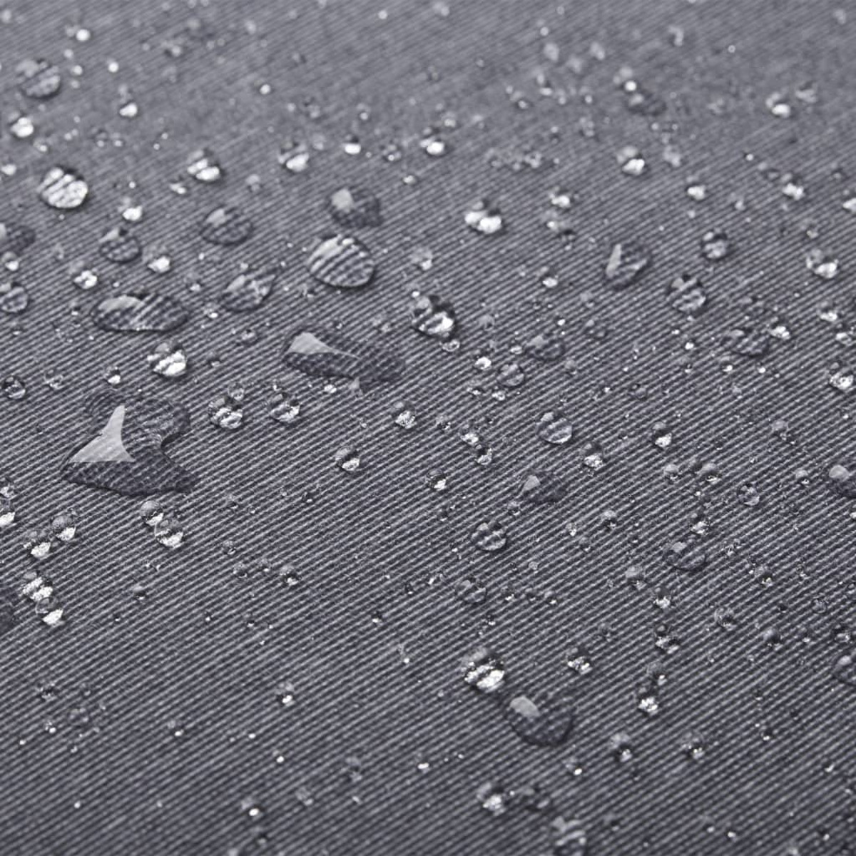 Close-up of fabric with water droplets. Gray color. Textured surface. 