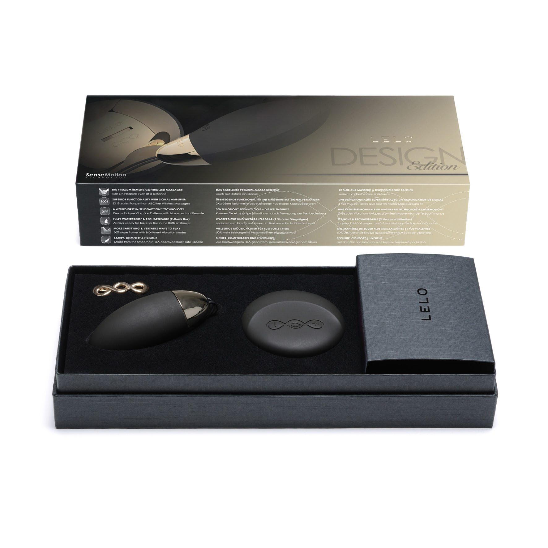 Caja de producto LELO negra abierta, que revela un vibrador negro y un panel de control, sobre una superficie blanca.