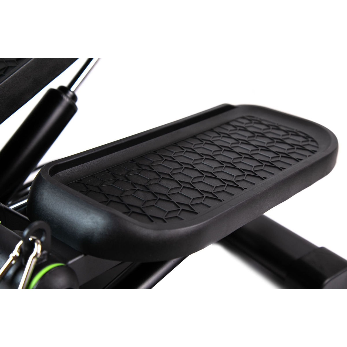 Nahaufnahme eines schwarzen Stepper-Fußpedals mit strukturierter Oberfläche.