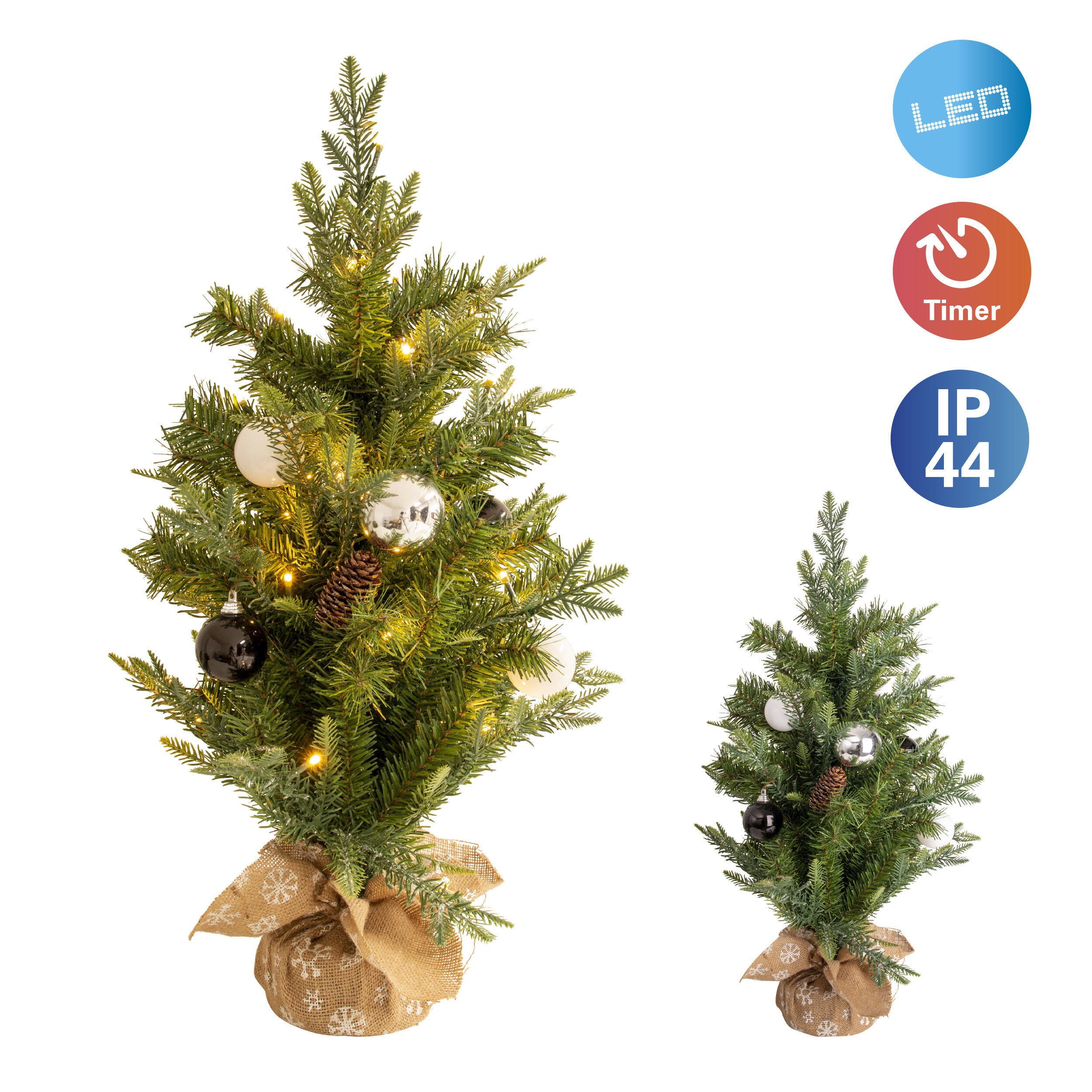 Zwei kleine Weihnachtsbäume mit Lichtern und Ornamenten, einer groß, einer klein.