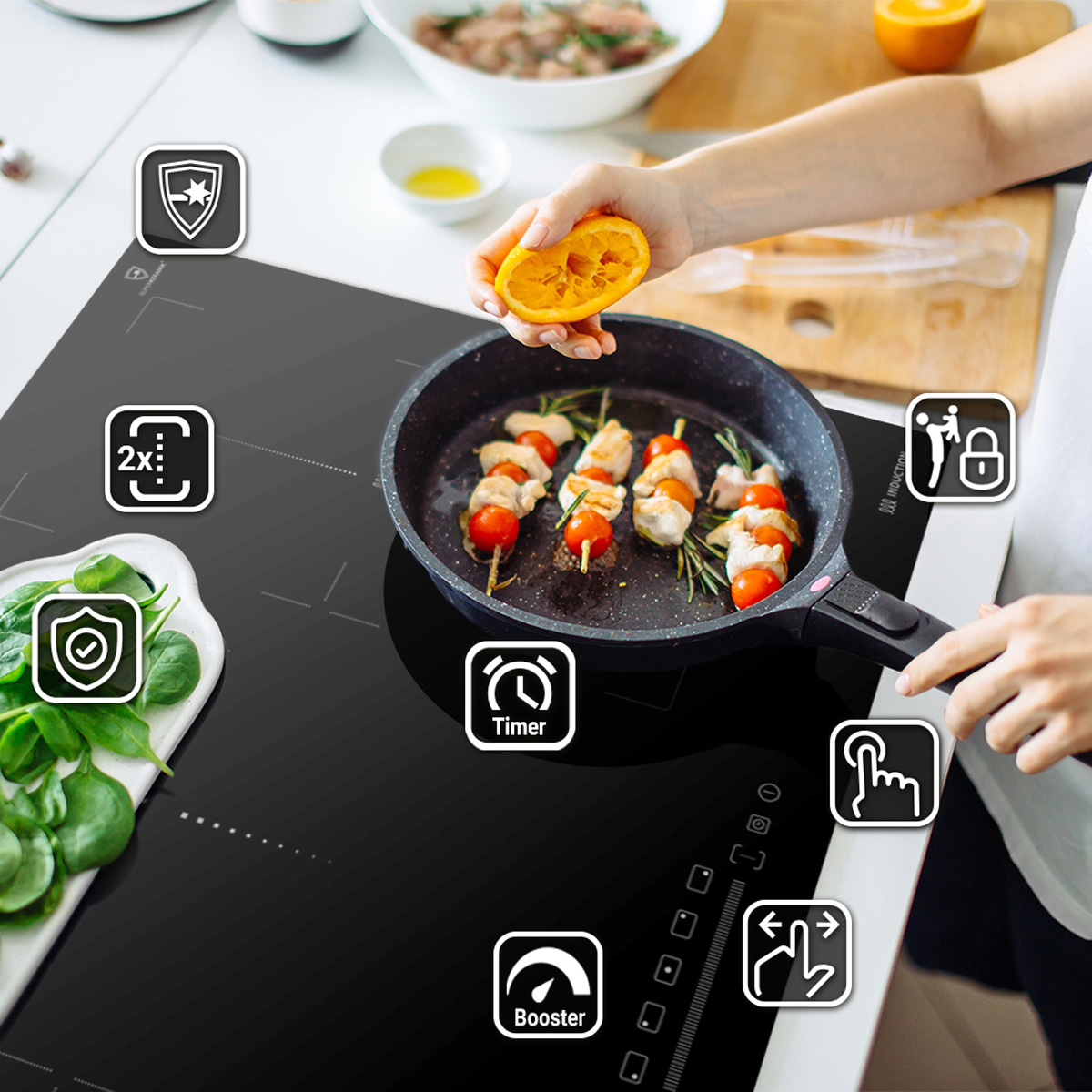 Eine Person kocht auf einem schwarzen Induktionskochfeld mit Symbolen und Zutaten.